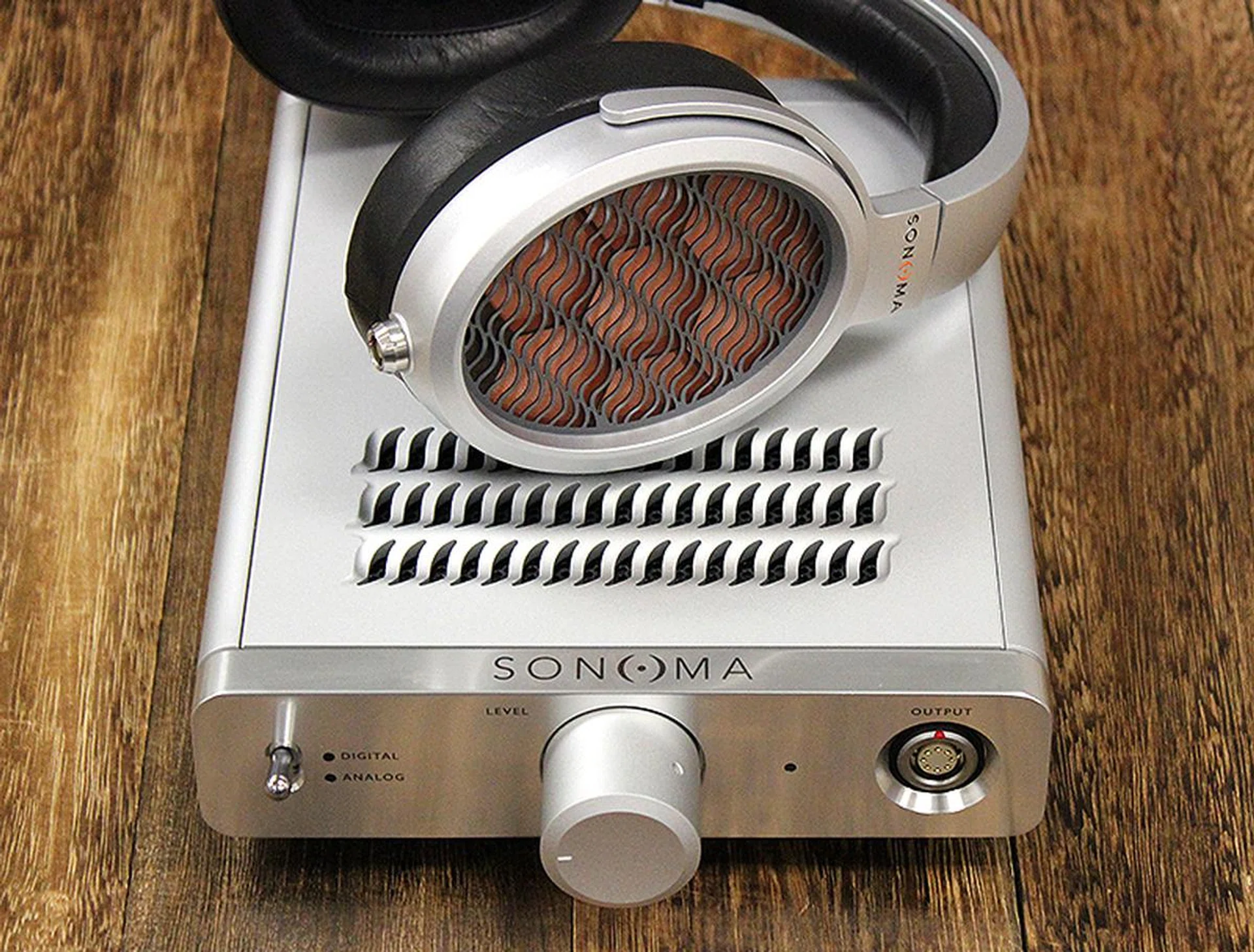 Vents above help keep the energizer cool because of its Class-A output design. The special wave patterns are similar to the ones found on the ear cups. 