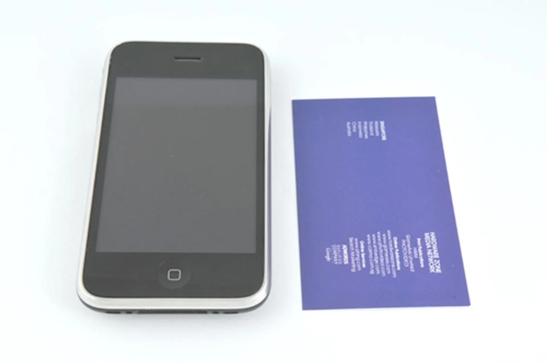 Next to our business card, the iPhone 3G looks overbearing!