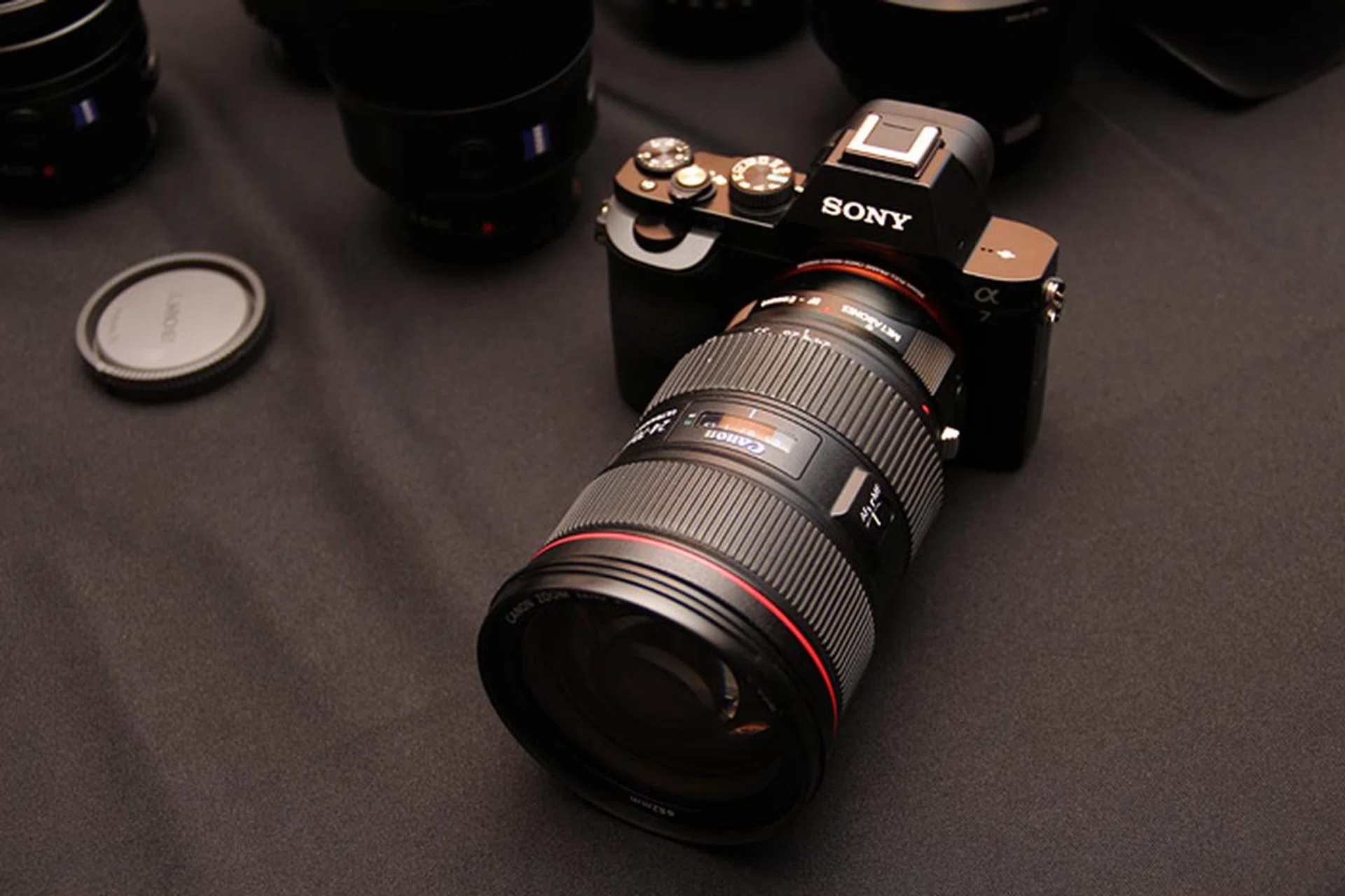You never thought you'd see it at a Sony event, but here's a Canon 24-70mm L lens mounted on a A7 with a Metabones adapter.
