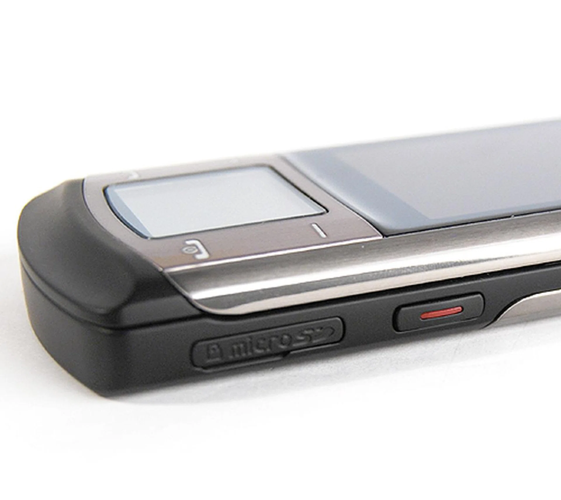 The camera button is well-protuded for easy access, and right below is the microSD slot which supports up to 8GB microSD capacity.