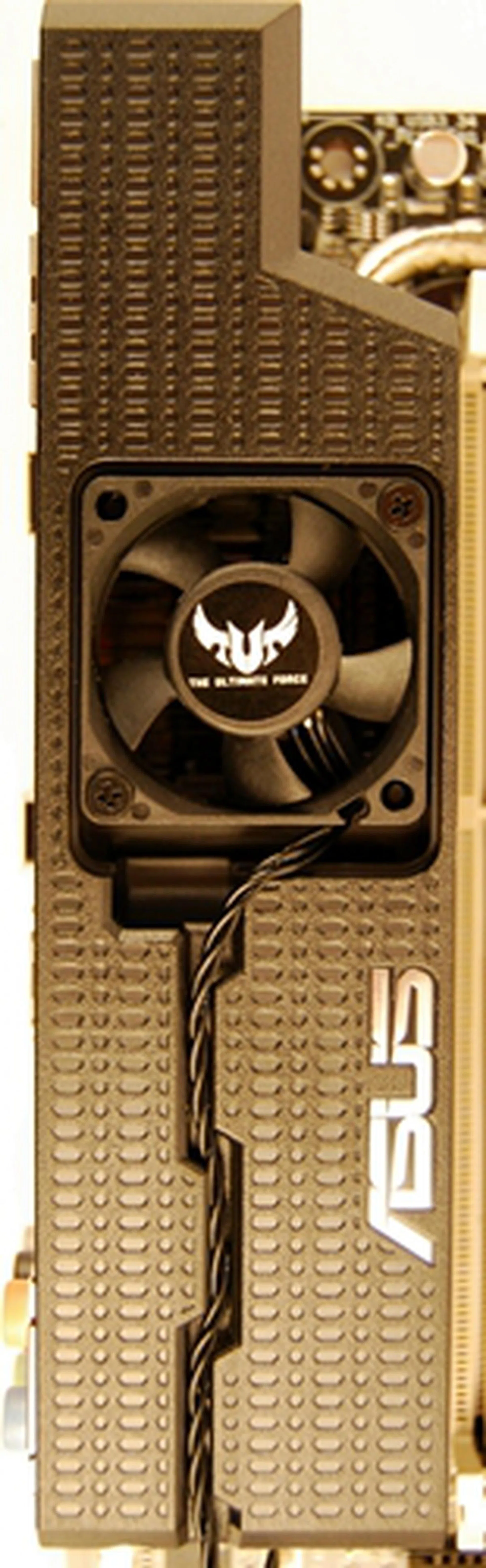 To complement the PCH cover and fan assembly, this component of the board's TUF Thermal Armor comprises the I/O panel plastic sheath and a mounted cooling fan. The fan is provided but has to be assembled and its spares are sold as optional accessories. The plastic sheath sits over the back panel I/O ports of the board and draws hot air from the VRM component area.