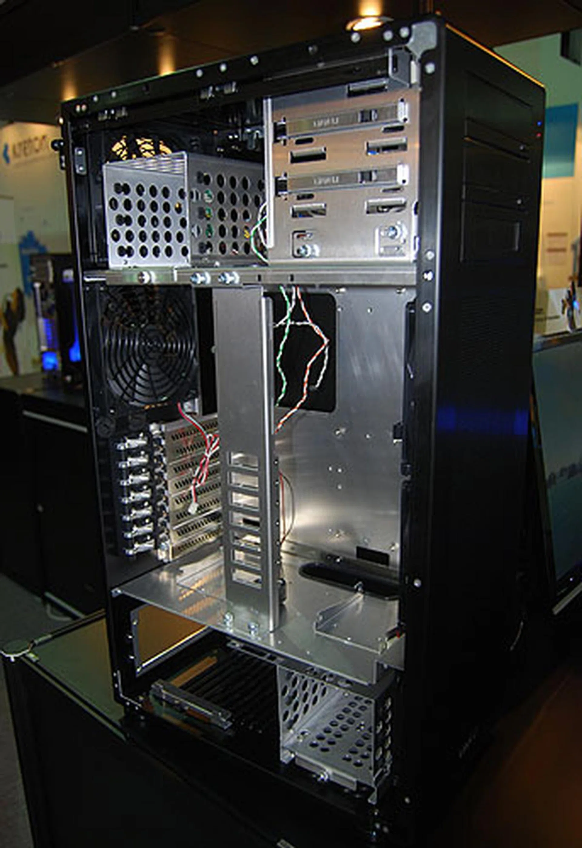  The X1000 is designed for either gaming or HTPC users and the form factor is similar to the X2000, with its height. The hard drives are also isolated at the bottom of the chassis, with three large 14cm fans at the front.  