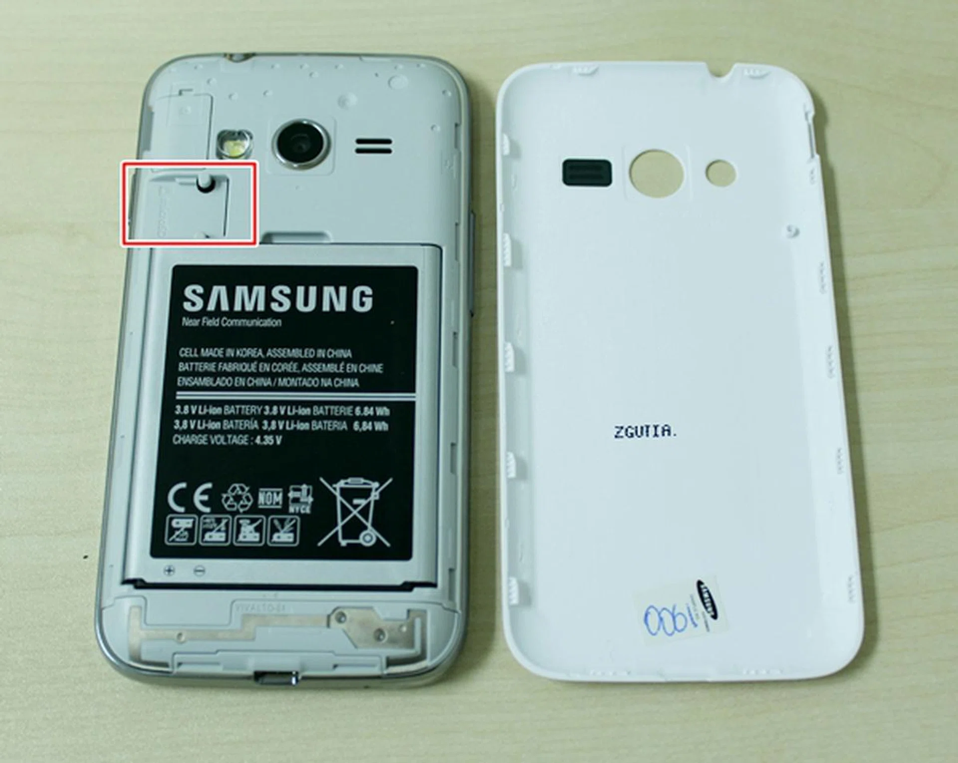 The micro-SIM card slot is located beneath the battery. The microSD memory card is located on the top left corner of the Samsung Galaxy Ace 4 LTE.