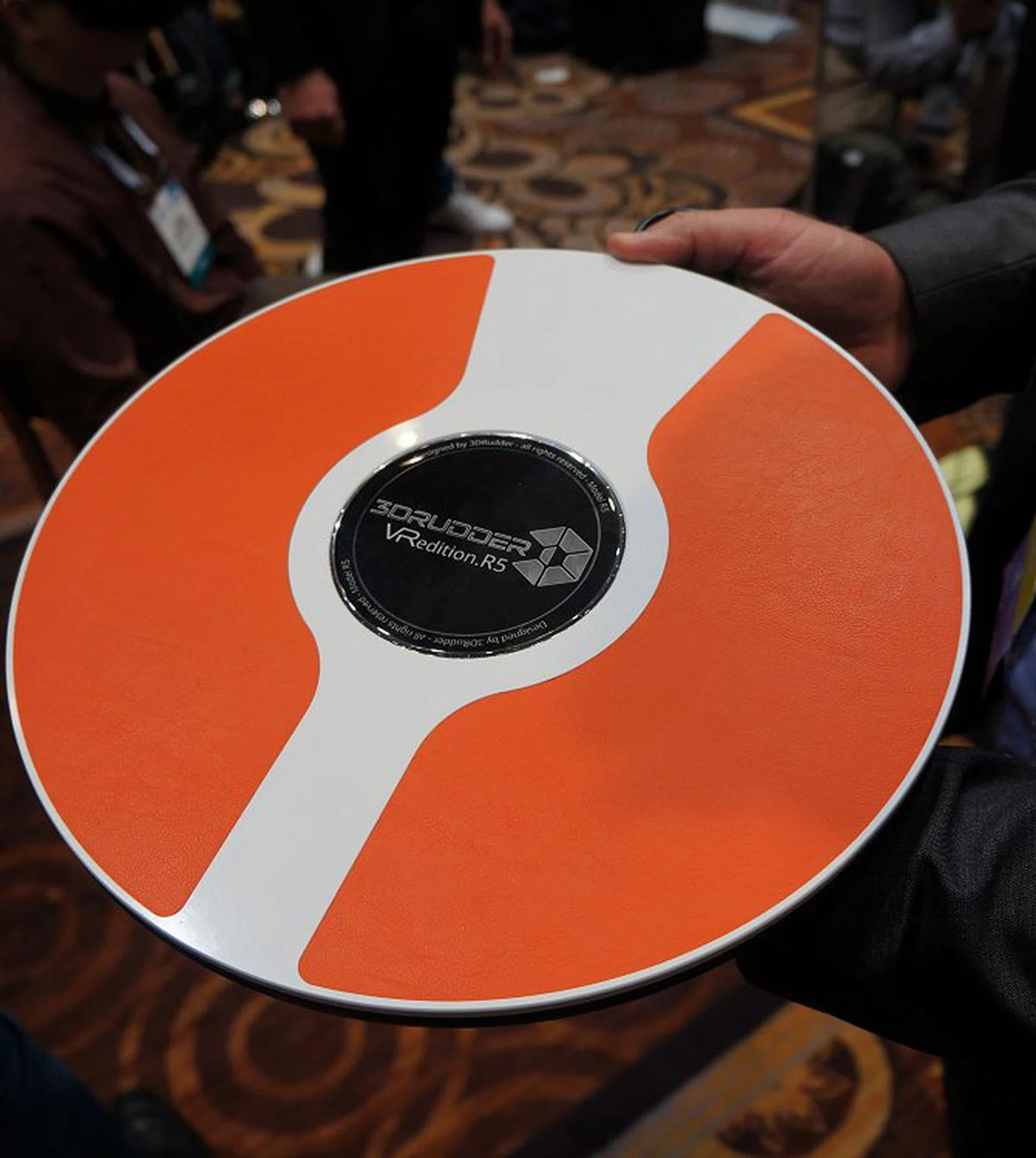 This disc-like object called the 3Drudder, is made for feet-based navigation input. It’s especially useful when you’re immersed in a VR world where you may have your hands busy with other forms of input devices and you can use your feet to help in navigational needs by tilting in the desired direction – sort of like what you would do on a Segway. 