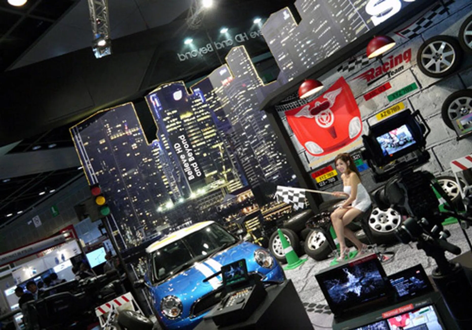Sony's booth was filled with a life-sized diorama to showcase the finer recording capabilities of their HD cameras and large sensor camcorders. There's even a swanky Mini Cooper S on deck!