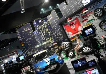 Sony's booth was filled with a life-sized diorama to showcase the finer recording capabilities of their HD cameras and large sensor camcorders. There's even a swanky Mini Cooper S on deck!