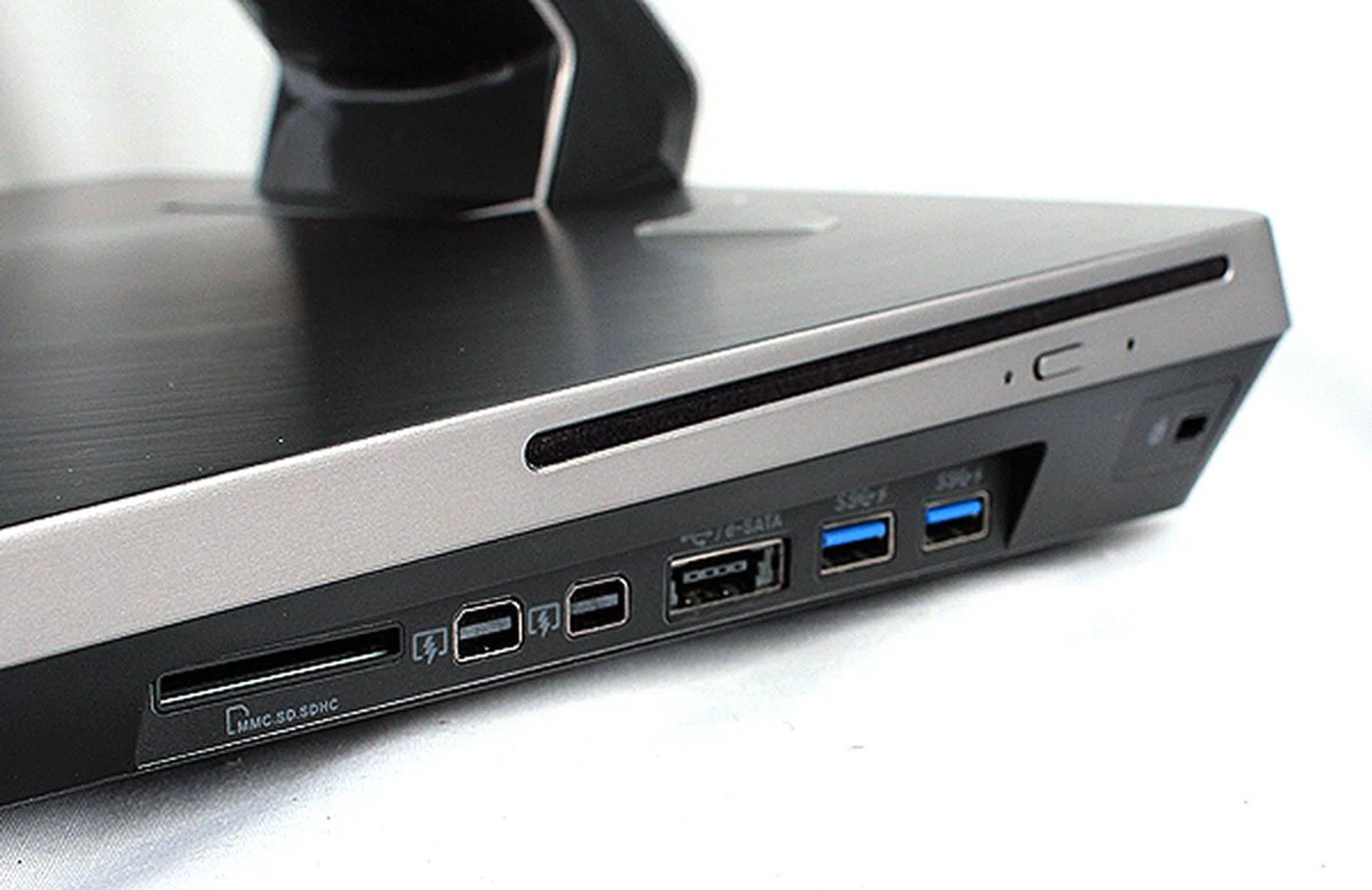 On the right, there's a slot-in SuperDVD combo drive, two USB 3.0 ports, an eSATA port, two Thunderbolt ports and a memory card reader.
