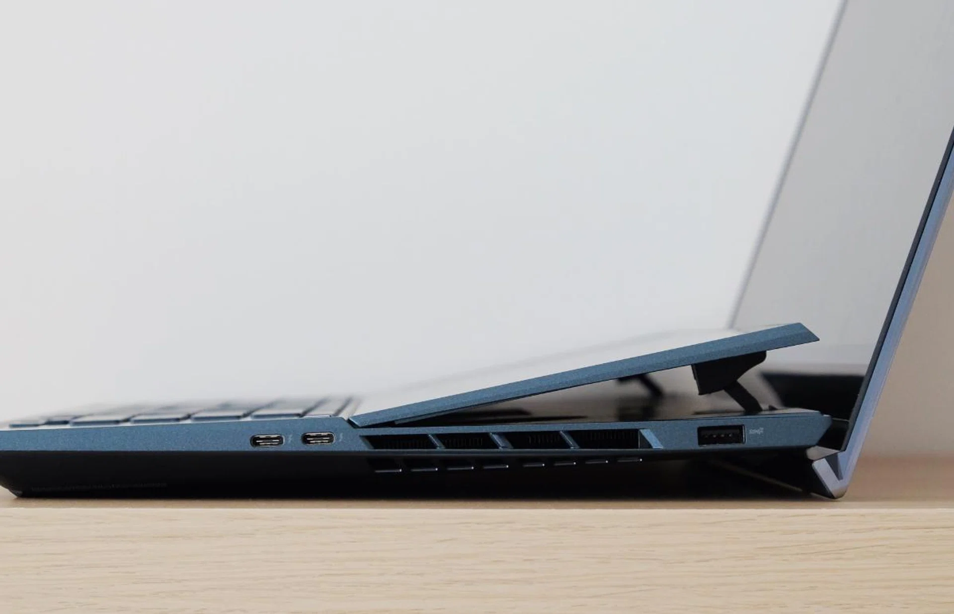 Look at how high secondary screen tilts. The two USB-C Thunderbolt 3 ports and single USB-A port are located on the right.
