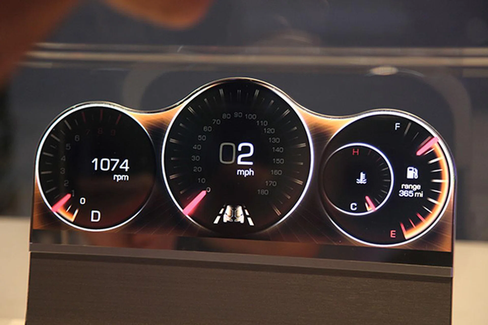 Sharp has developed free form displays that can be used in custom designs such as the vehicle dashboard shown above here. Using the IGZO technology that enables the gate driver circuits to be embedded inside the active area, various shapes and narrow fringe along the edge of the display can be easily achieved.