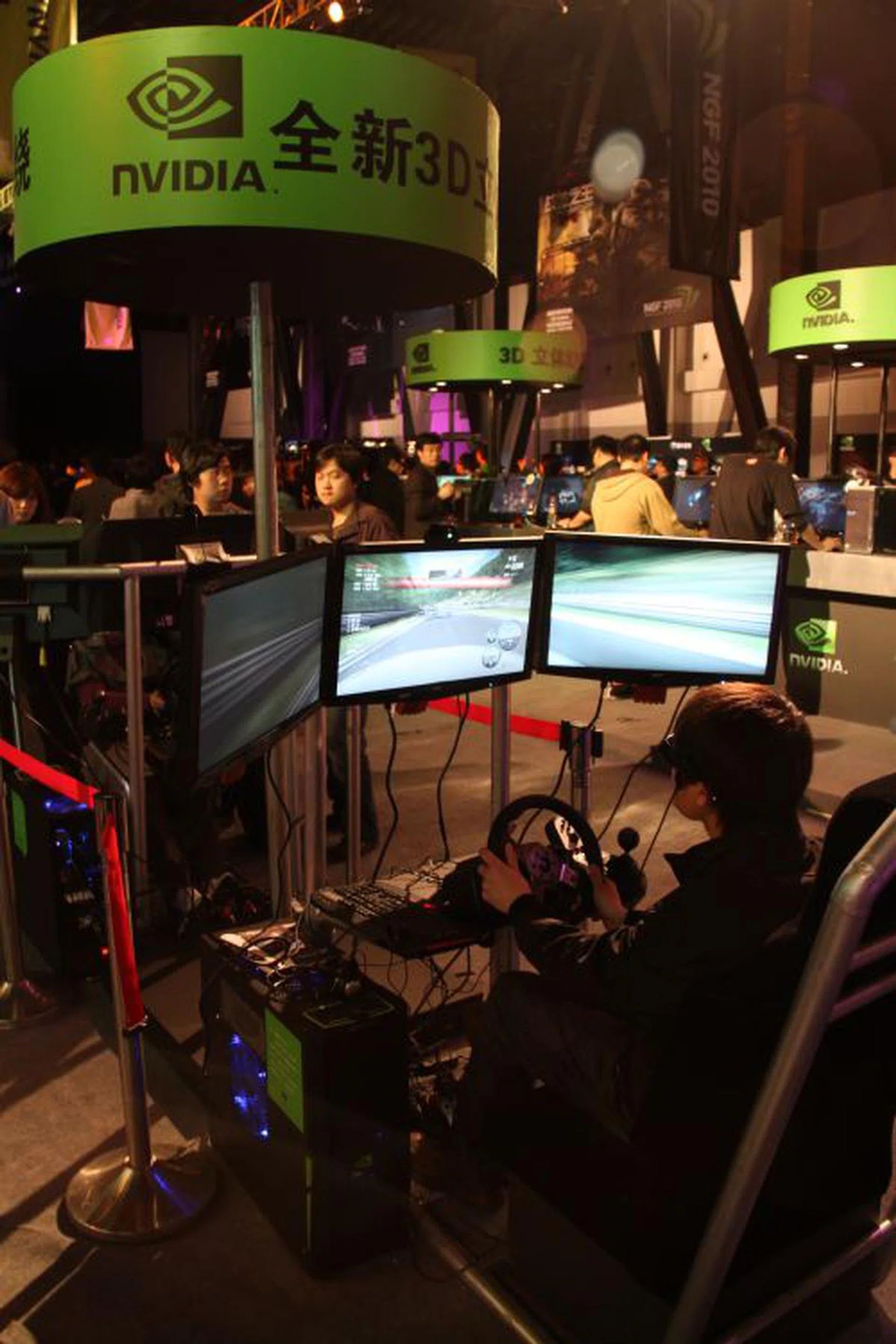 NVIDIA believes that it made a wise choice when it preached 3D Vision early, as 3D is now fast becoming the next-generation trend among manufacturers, developers and gamers. Riding on this trend, NVIDIA expanded this to incorporate surround gaming elements to 3D gaming with the recent 3D Vision Surround standard as seen here by a consumer experiencing it at the show.