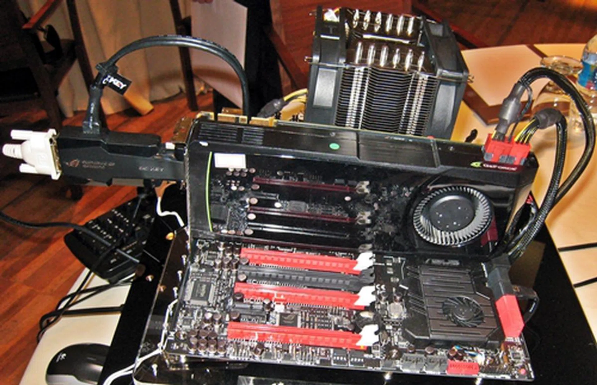 This Rampage Extreme IV board was on display at the technical seminar. The appendage that extends from the GeForce graphics card is the OC Key, a revolutionary OC equipment that is bundled with ROG Extreme series models only. It offers on-the-fly hardware tweaking without any software as well as outside the UEFI BIOS and operating system environment.
