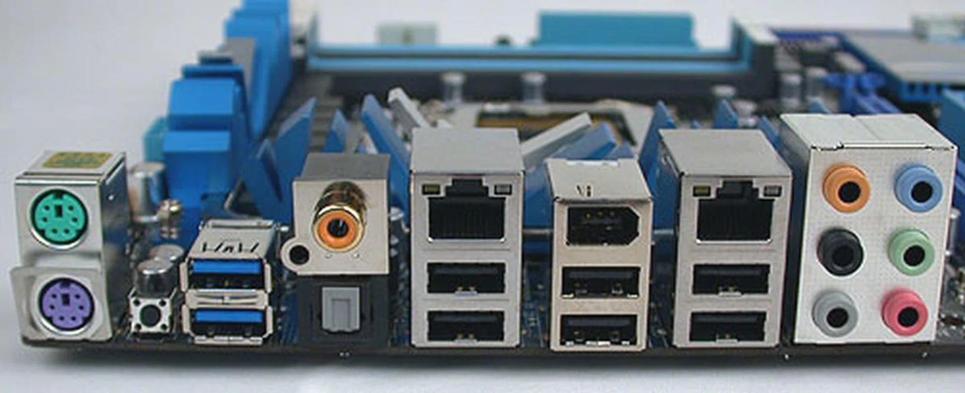 The blue USB ports here are the new version 3.0. They are backwards compatible of course and altogether, one finds eight USB ports at the rear. A small black Clear CMOS button is also found though unlike other boards in this series, there's no eSATA.