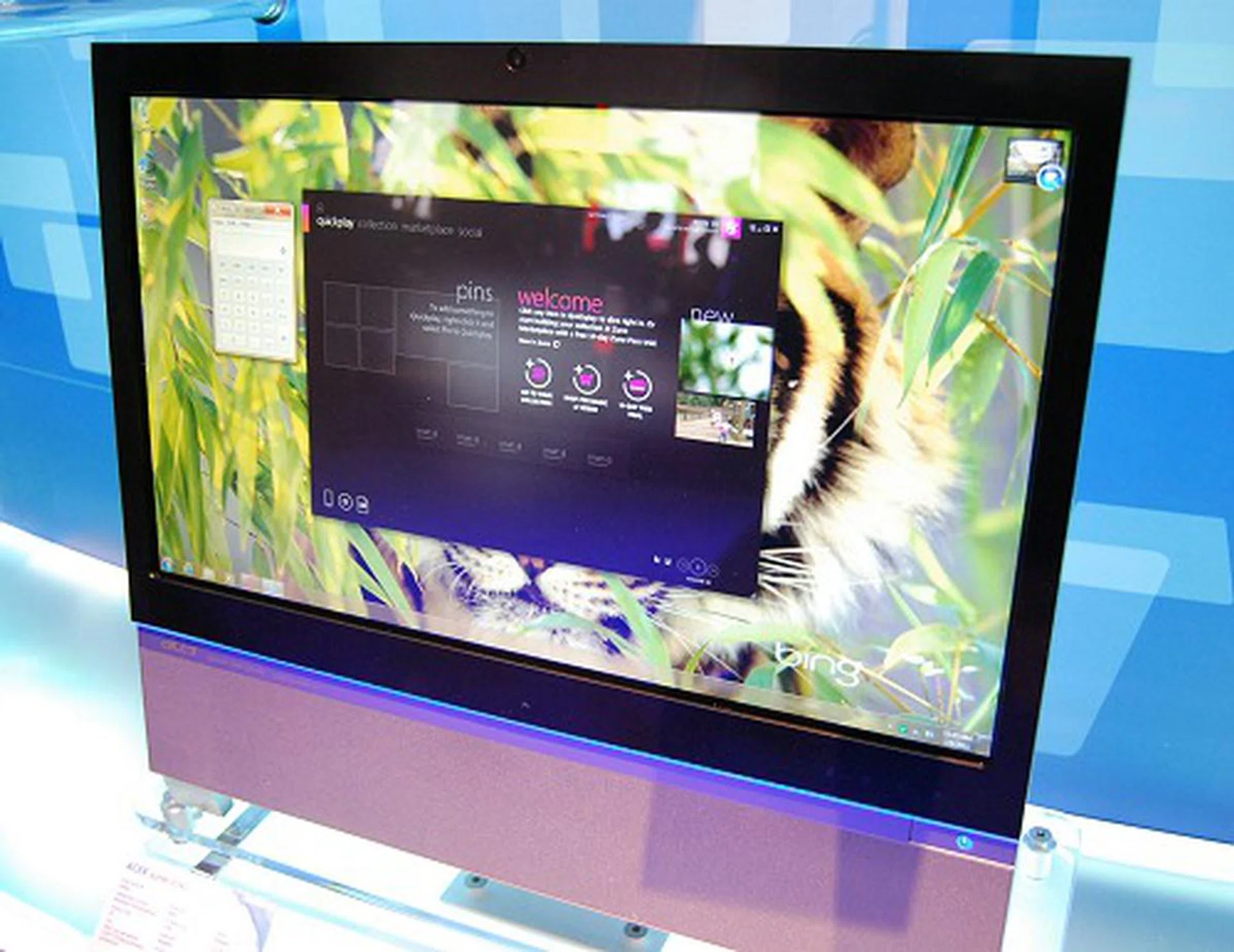 Here's Acer Aspire's Z5761, a 23-inch AIO machine with a Sandy Bridge Core i7 processor, 16GB RAM, 1.5TB of storage and also comes with Dolby Home Theater technology. The design is a hit or miss thing, depending on individuals.