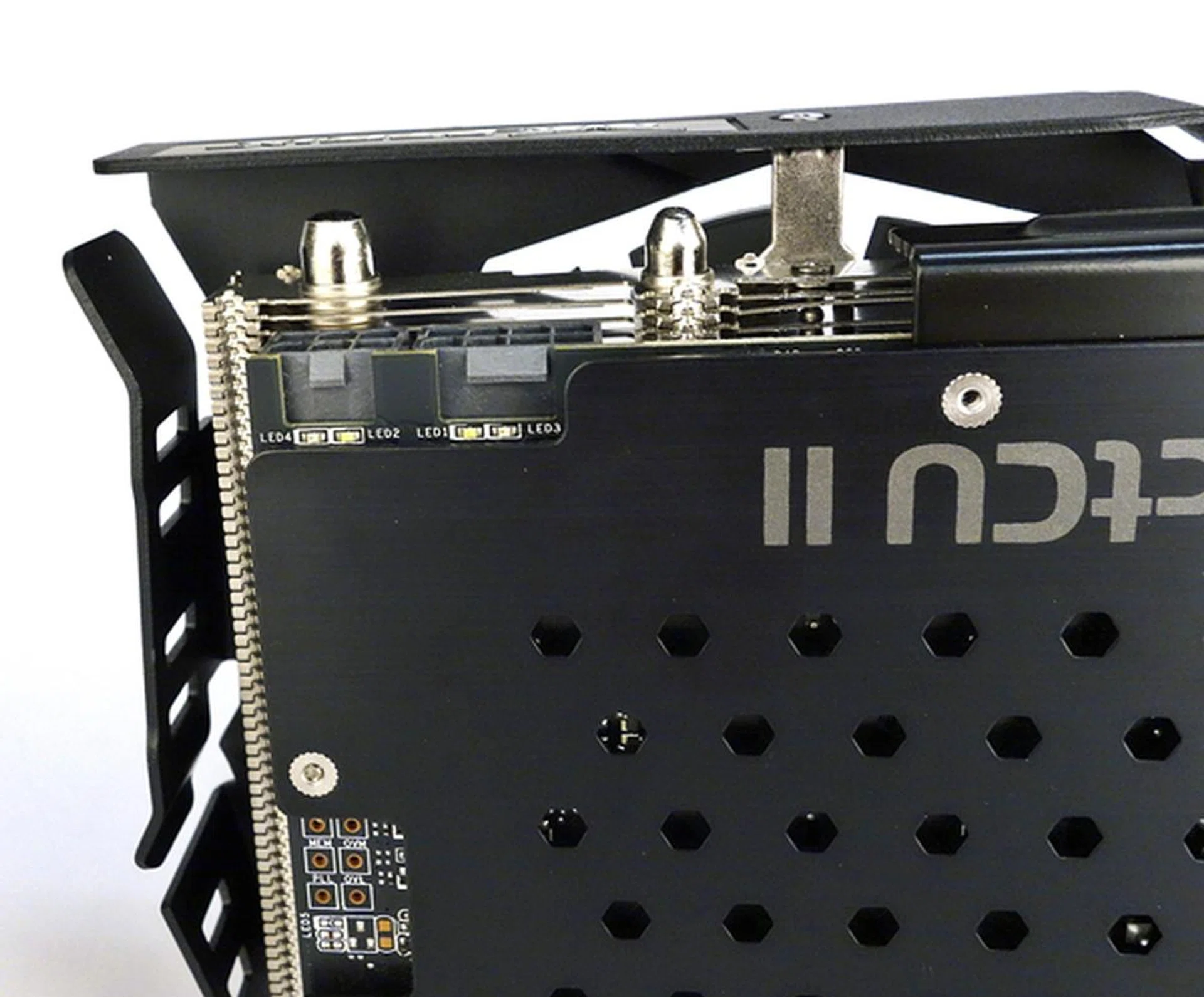 On the left, we see the 6-pin Molex power connector and the 8-pin one is on the right. Both power connectors have LEDs to indicate if their respective power cables have been inserted properly.