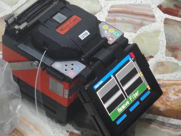 This machine here tests the fibre optic cable in its transmission as well as bonding two ends of a fibre optic.