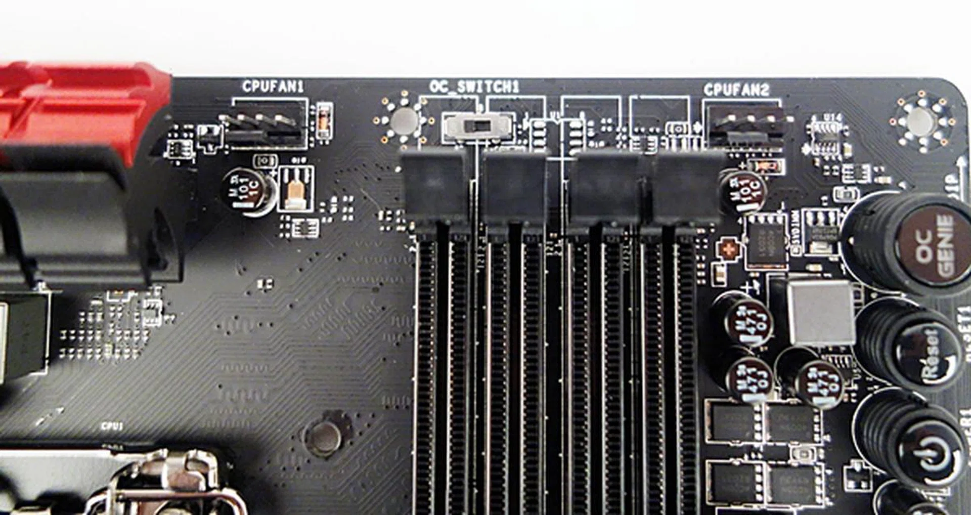 The OC Genie Mode switch is located near the DIMM slots. In the photo, the Gear 1 mode is engaged, if the switch is moved to the opposite side, the Gear 2 mode will be engaged.