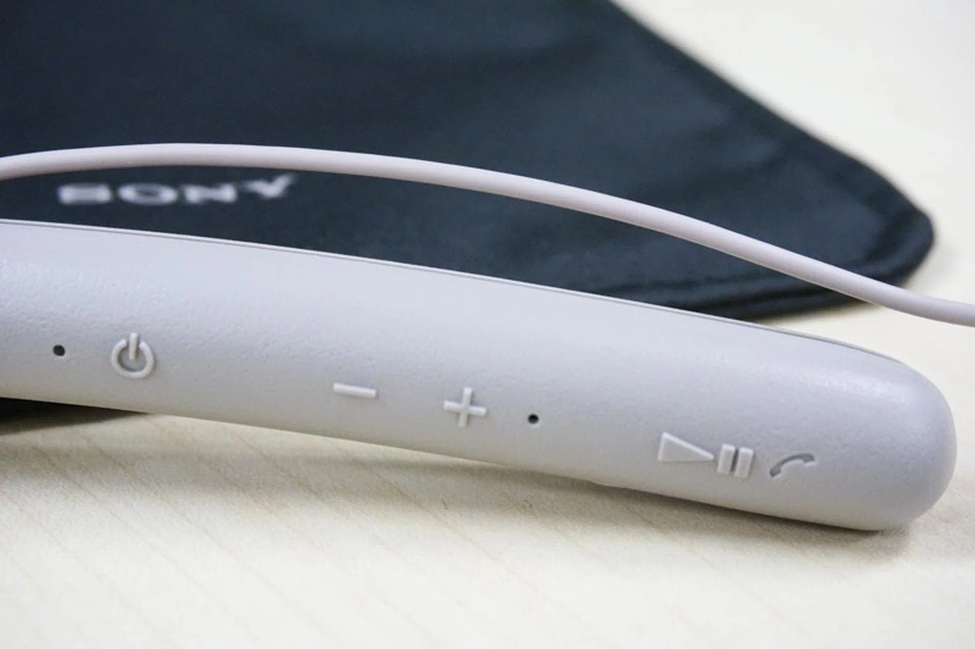 Embossed controls make sense for when you're reaching for them without looking.