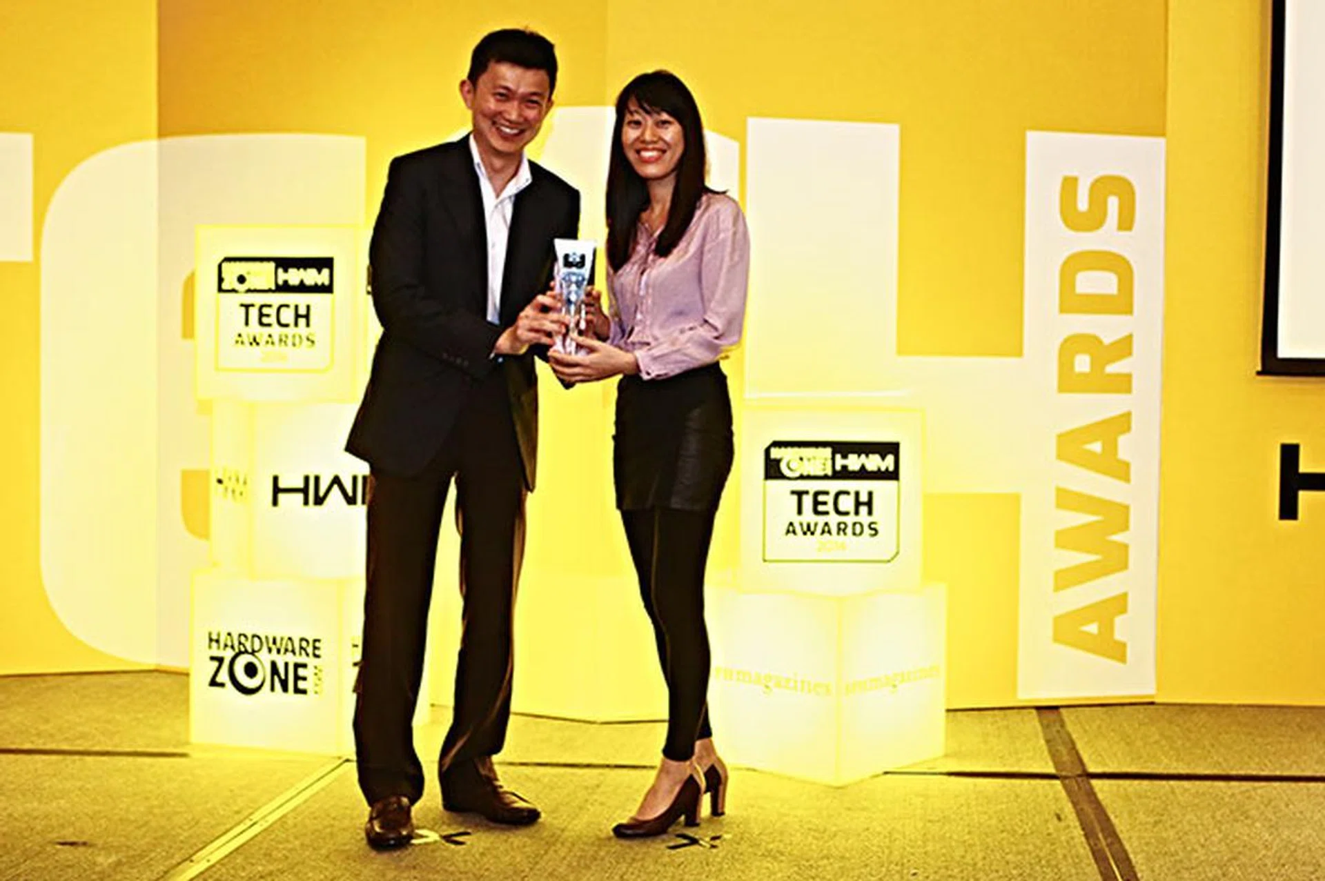 Panasonic took home two Editor's Choice awards: Best Point & Shoot Digicam (Lumix DMC-TZ40) and Best Mirrorless Camera (Lumix DMC-GX7). Here's Ms. Karen Do from Panasonic receiving the awards.