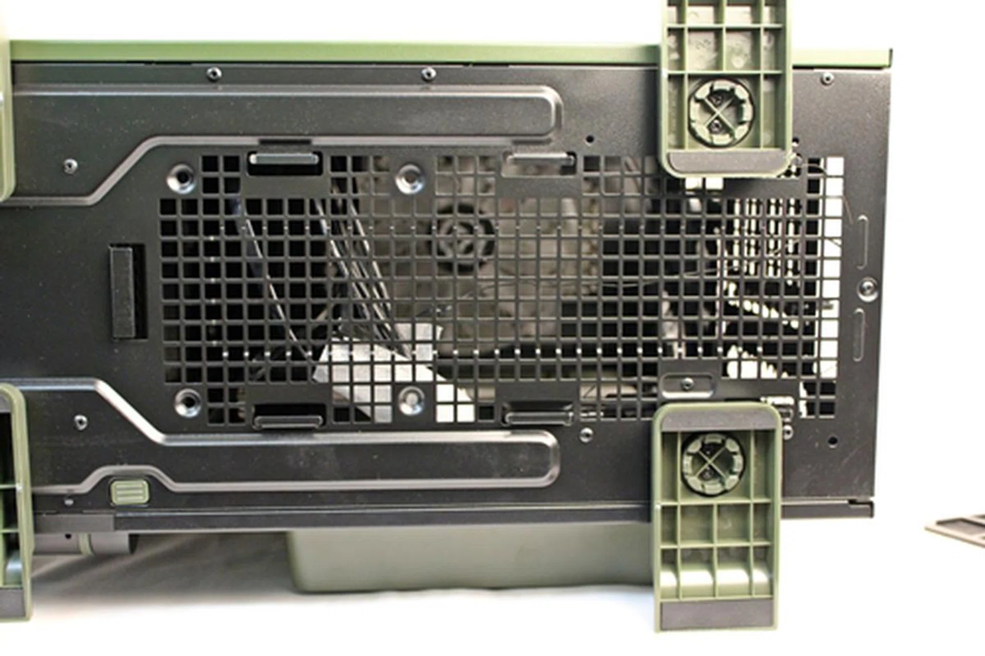 With the bottom dust filter removed, we can see a lot of square cut-outs that make up the entire bottom air intake.