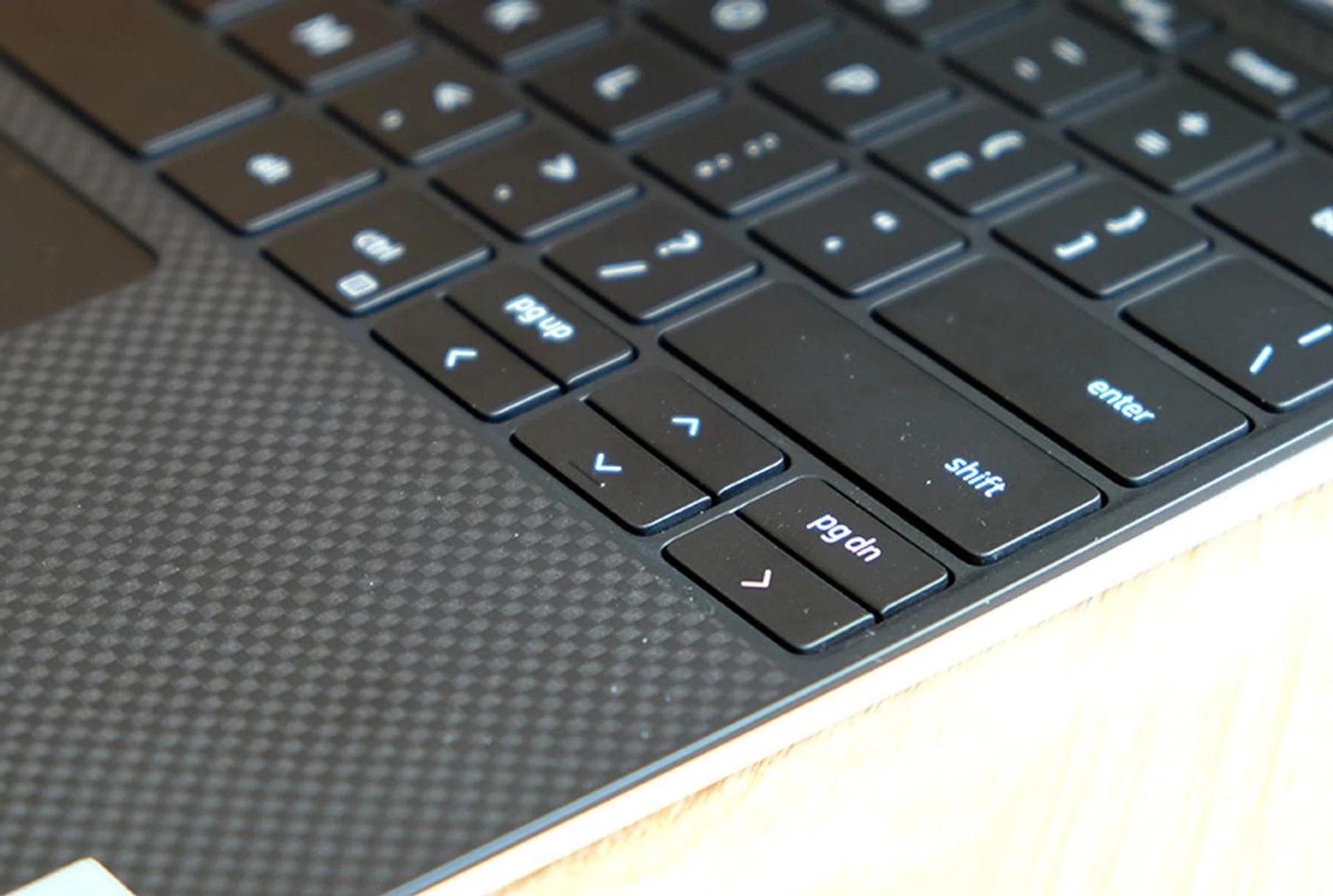 There are Pg Up and Pg Down keys next to the up arrow key.