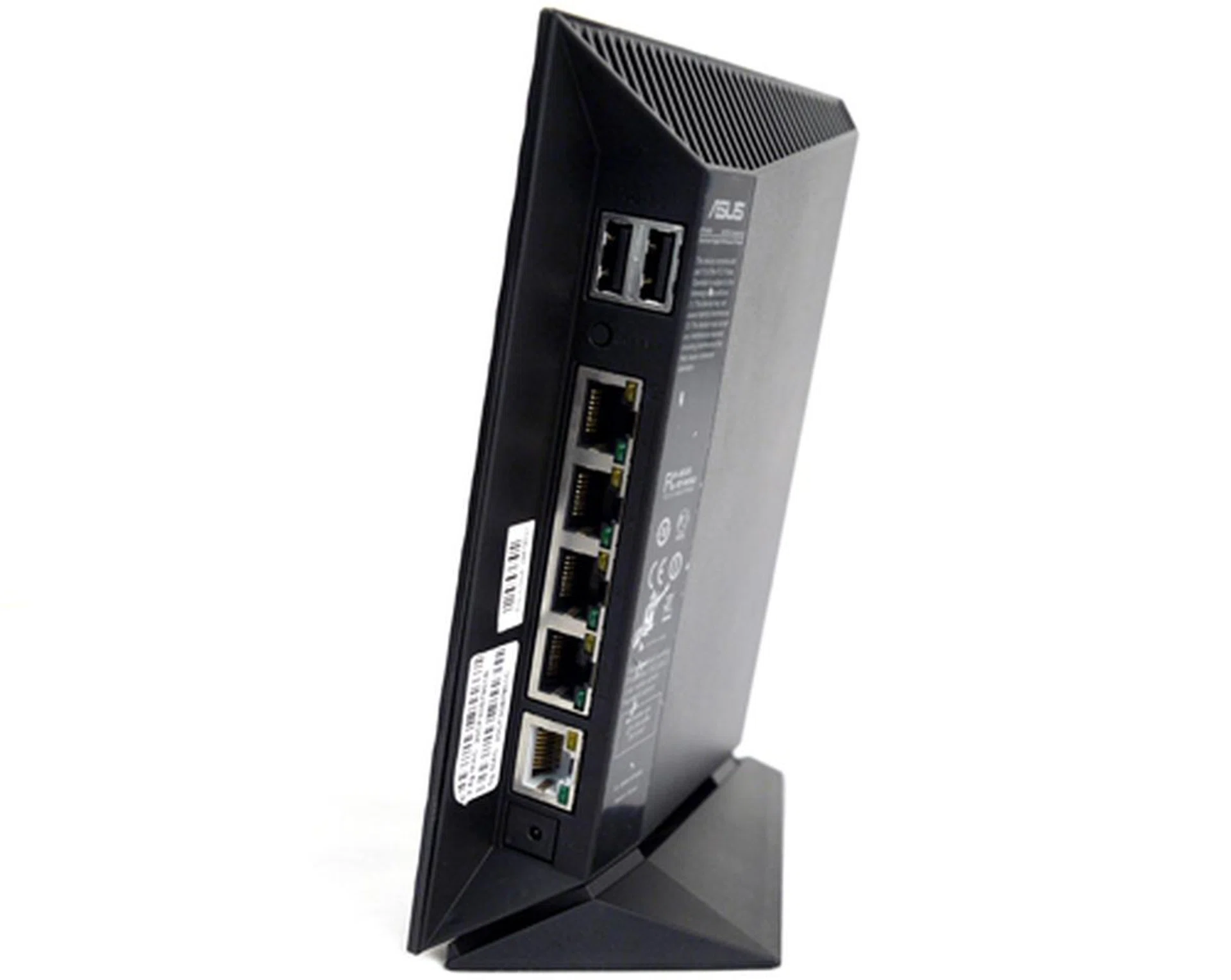 It's not so slim now, is it? Anyway, expect an array of Gigabit LAN and WAN ports plus two USB 2.0 slots behind the router. See if you can spot the Reset button.