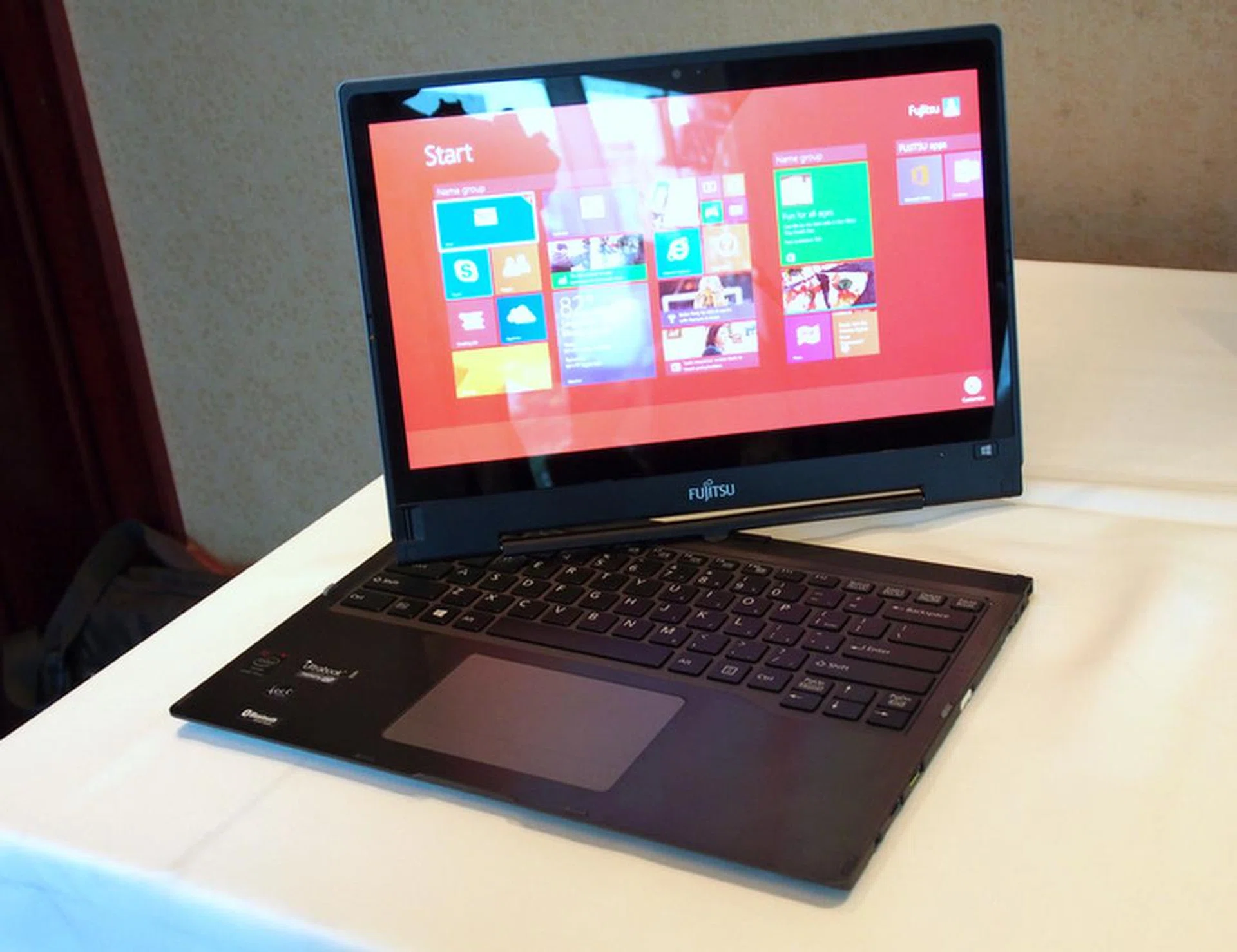 The Fujitsu Lifebook T904 has a swivel mechanism that lets it swivel its display into any angle you want. 