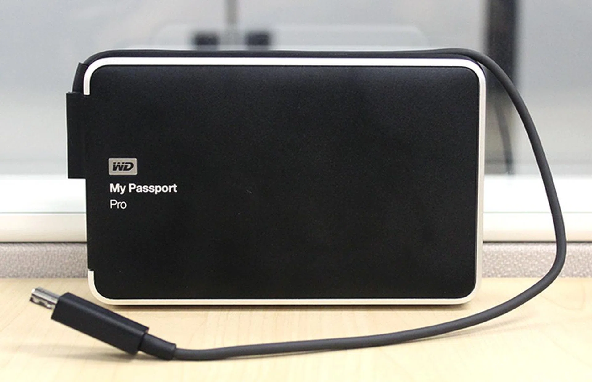 The My Passport Pro's Thunderbolt cable is integrated within the drive itself for added convenience.