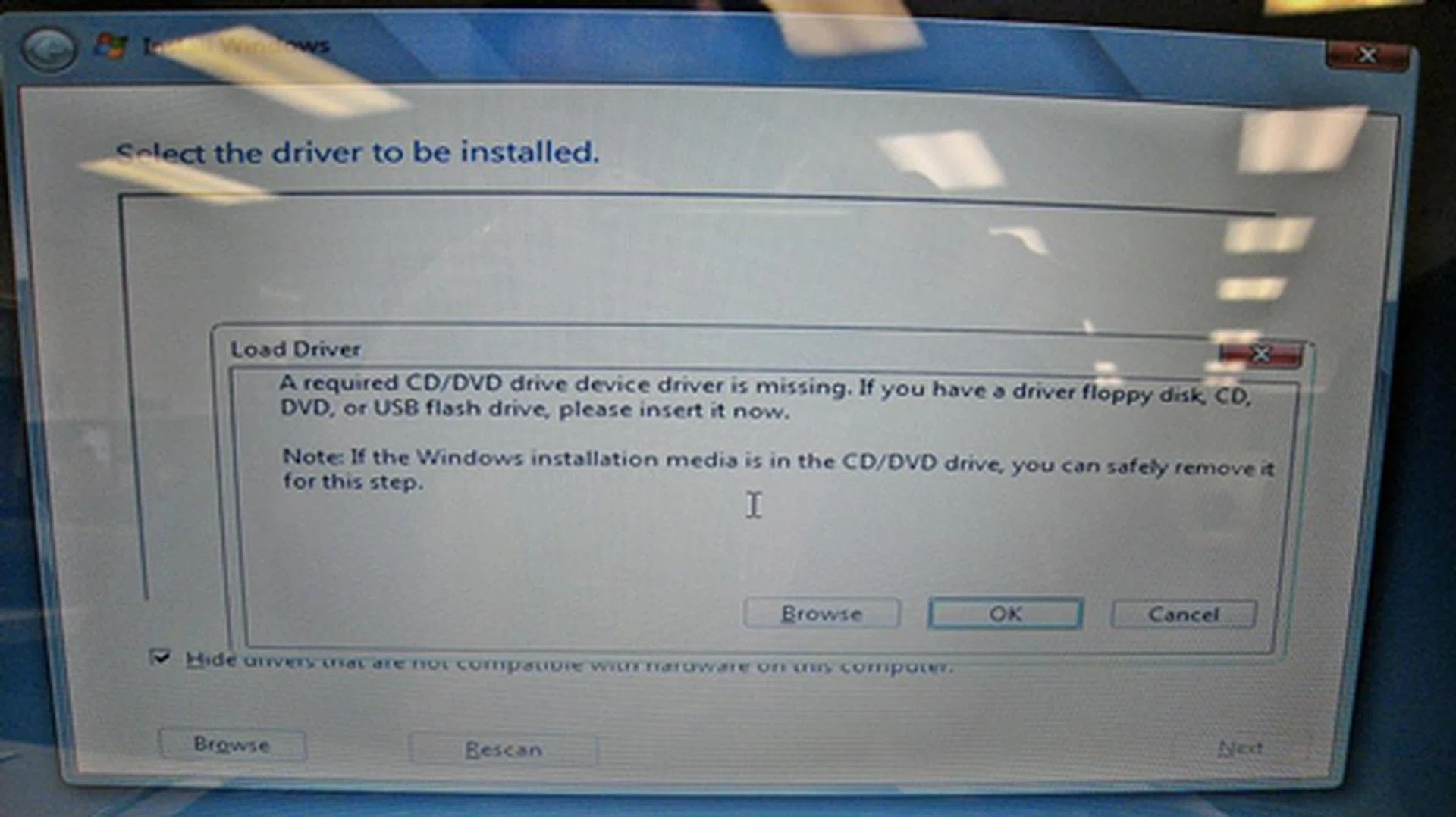 The error message stated that the CD/DVD drive device driver was missing from the installation disc. It turned out we had a corrupted ISO.