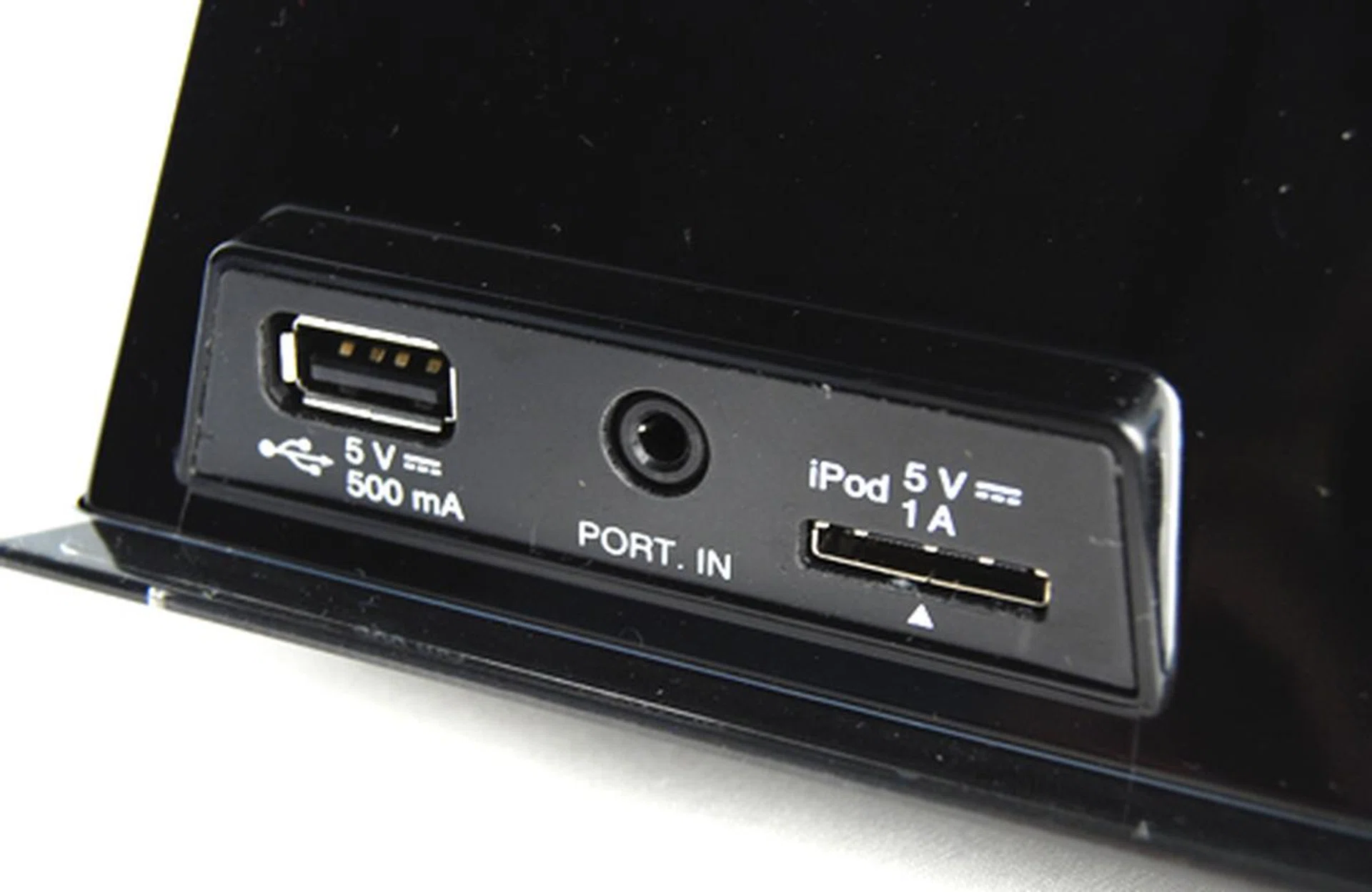 On the sides, there's a 3.5mm stereo auxiliary jack, an input port for the iPod connector and a USB port that can play movies, music and even photos directly from USB flash drives.