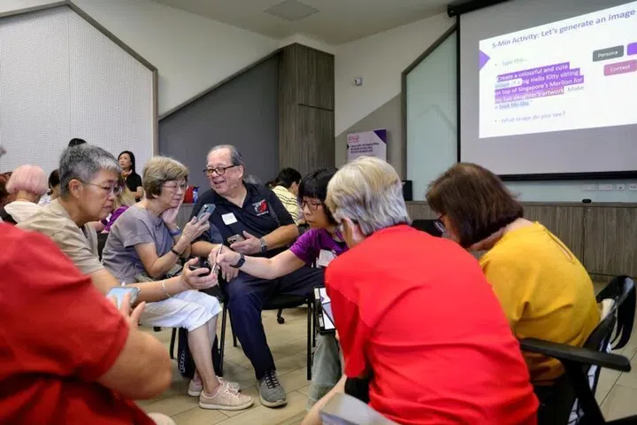 Seniors in deep discussion at a Gen AI literacy workshop