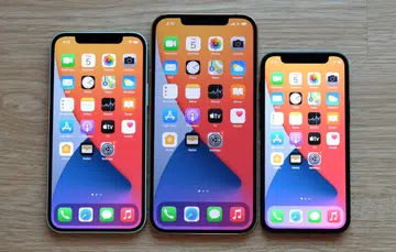 From left to right: The Apple iPhone 12, iPhone 12 Pro Max, and iPhone 12 Mini.