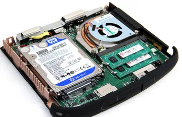 As you can see, the hard disk takes up bulk of the space. The processor is top-right under the blower-style cooler. Just south of the processor is the memory. If you buy the barebones edition of the system, you'll have to install your own storage and memory - none will be supplied.