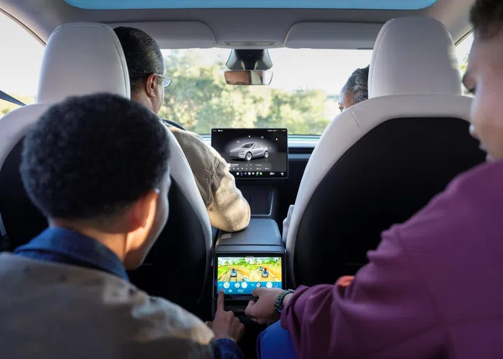 Like the new Model 3, the updated Model Y has a second-row display for rear passengers. Photo: Tesla