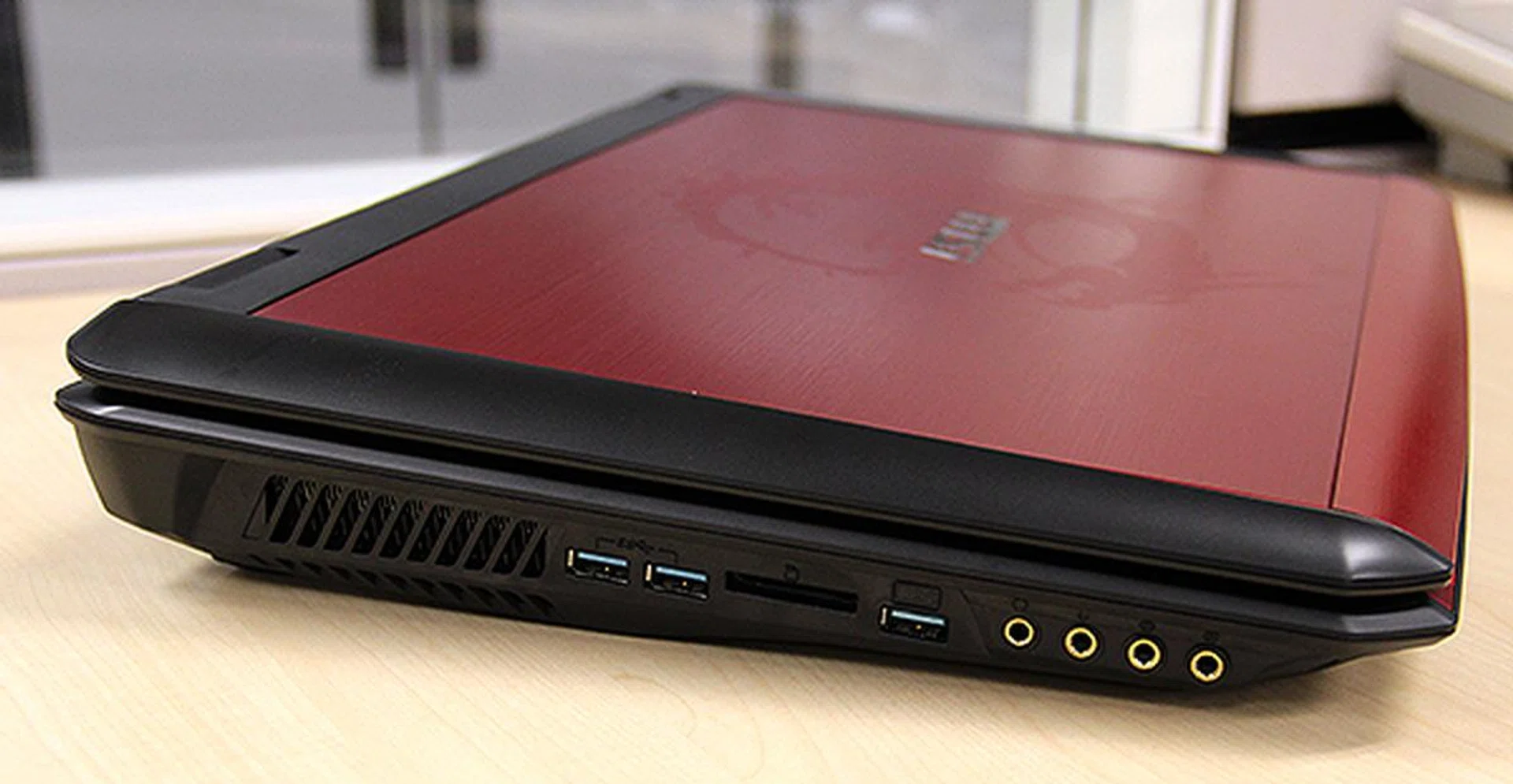 On the left are three USB 3.0 ports, memory card reader, and various audio jacks - headphones, microphone, line-in and line-out.