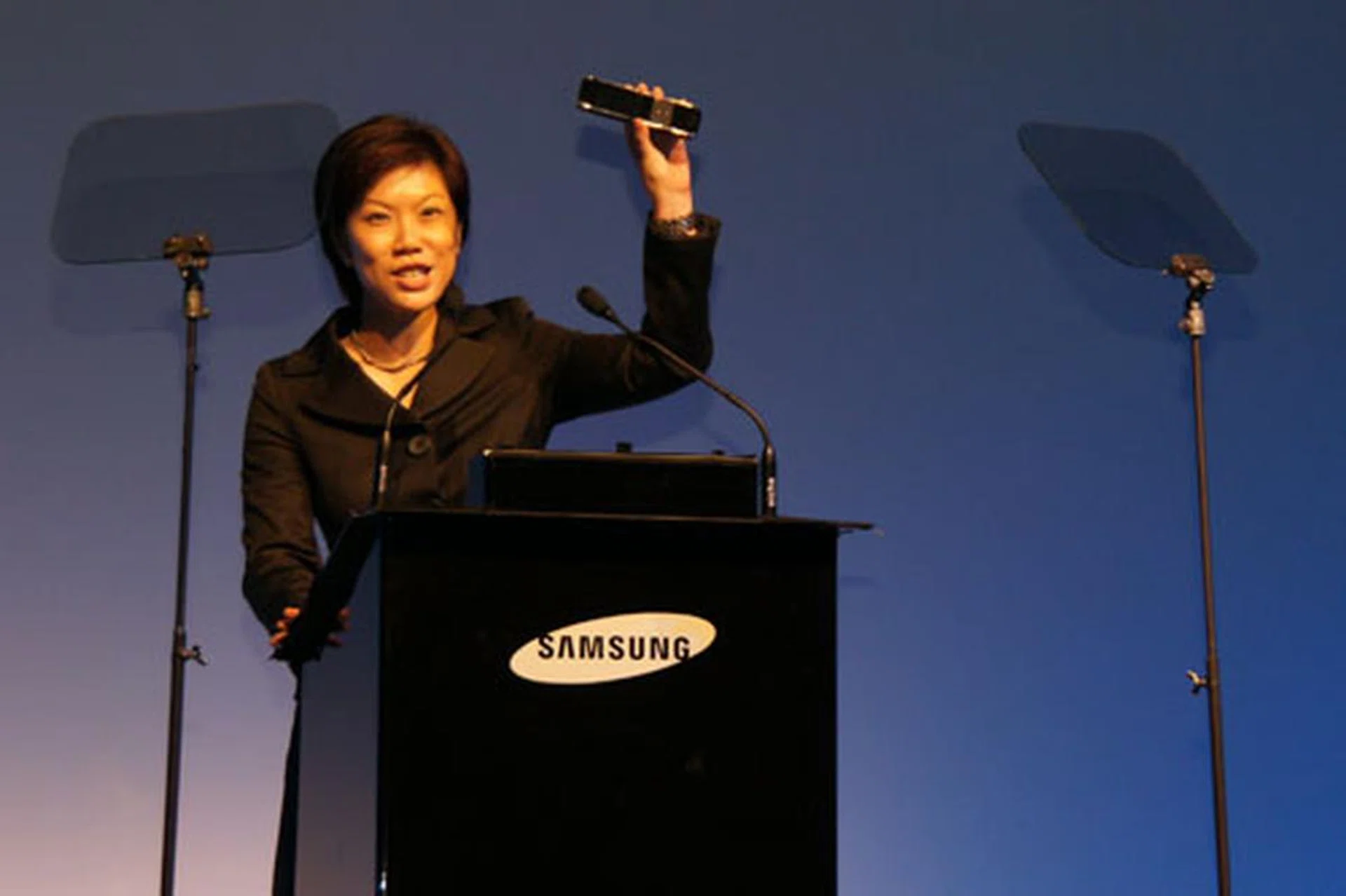 Irene Ng, Strategic Marketing Director of Samsung Singapore, waves the touch-screen remote control for the flagship LED 9000 HD 3D TV.