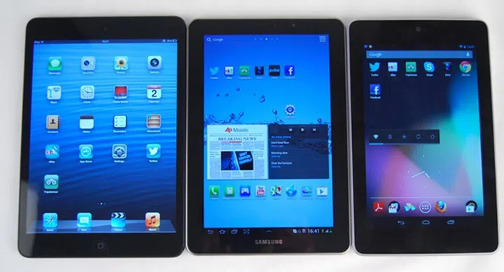 From left to right: Apple iPad Mini, Samsung Galaxy Tab 7.7 and Google Nexus 7.