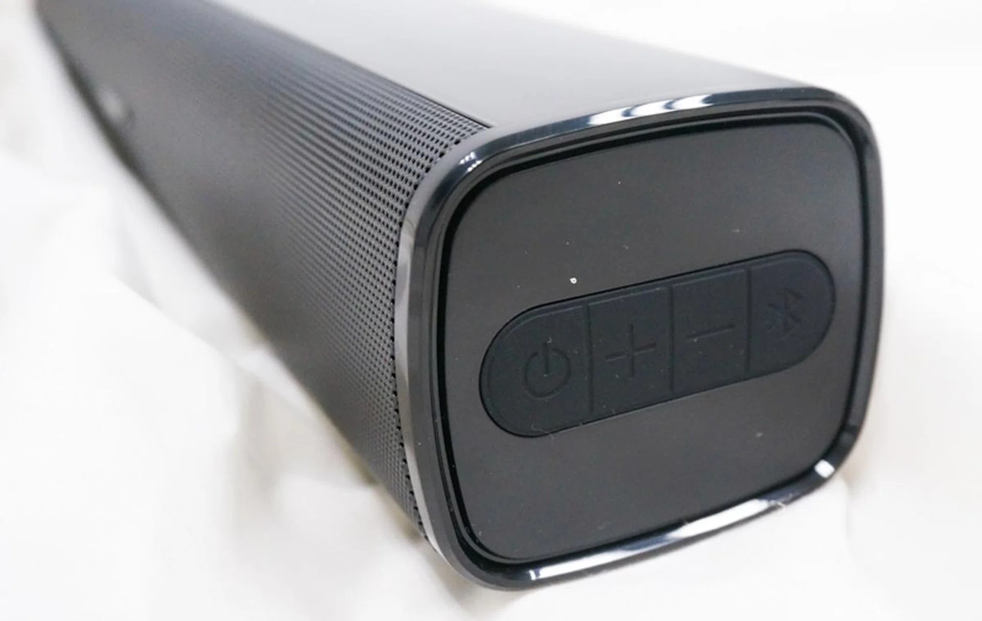 Basic controls are on the side of the soundbar.