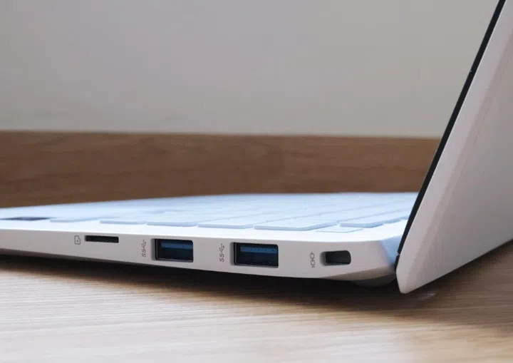 Lots of ports. Seen on the right profile of the notebook are two Type-A USB 3.2 Gen 2 ports, a microSD card reader and a Kensington locking slot.