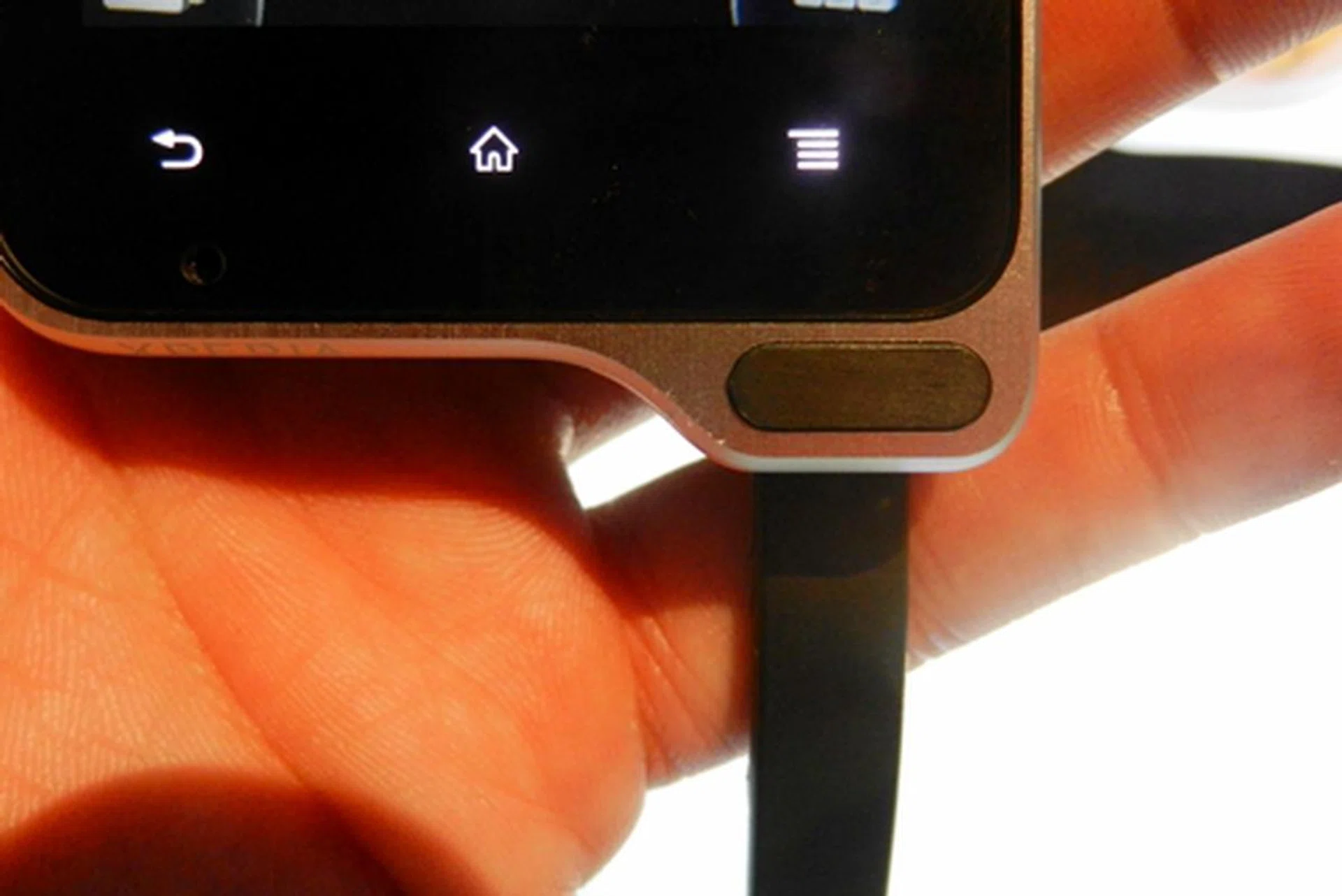 Pictured here is the wrist strap that is attached to the Xperia active via the hook.