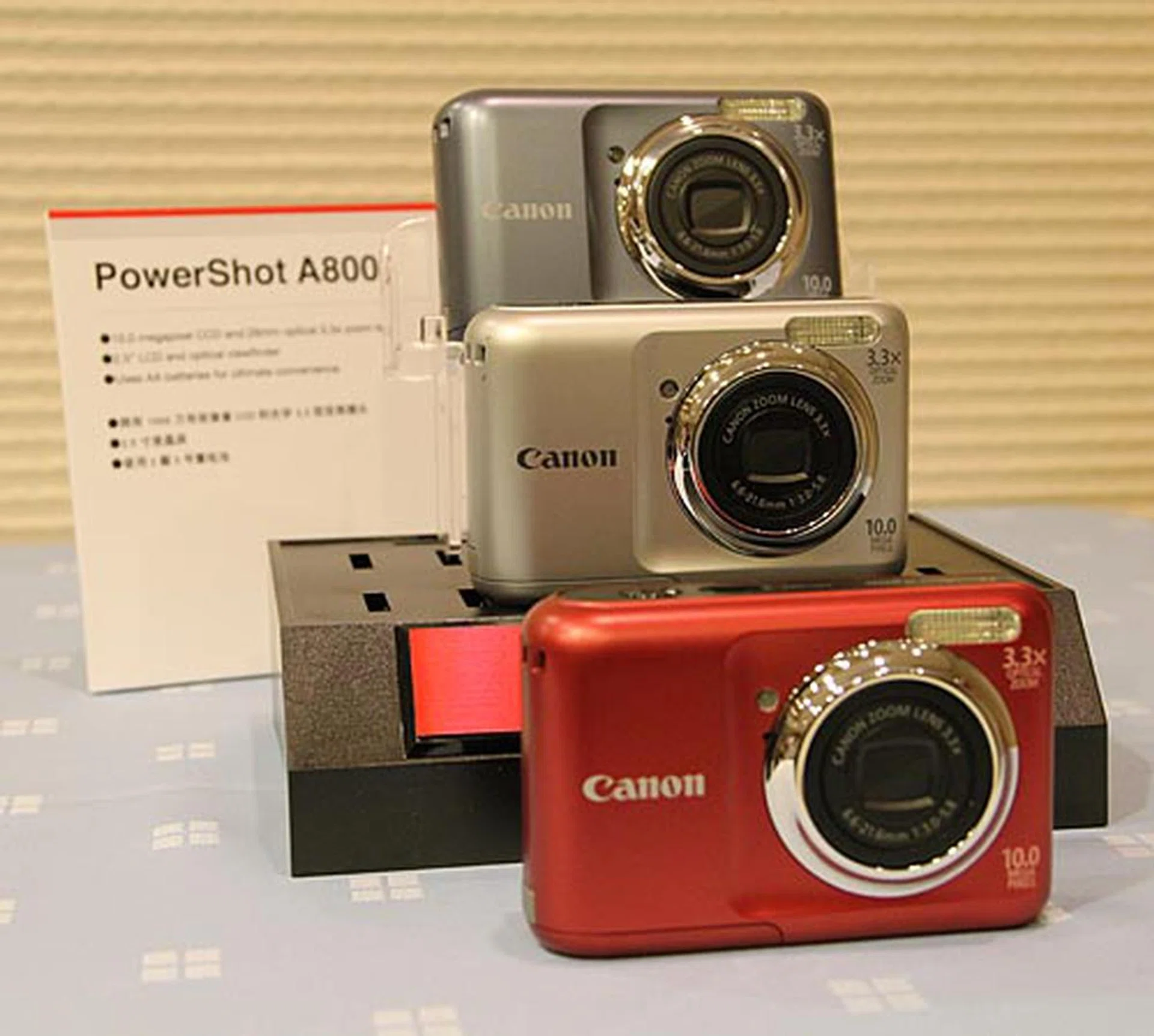 The 10-megapixel PowerShot A800 comes with 4x optical zoom, 2.5-inch LCD, Smart Auto mode that detects 19 different scenes, Blur Reduction mode, and VGA movie recording. Powered by AA batteries, the camera comes in red, gray, and silver.
