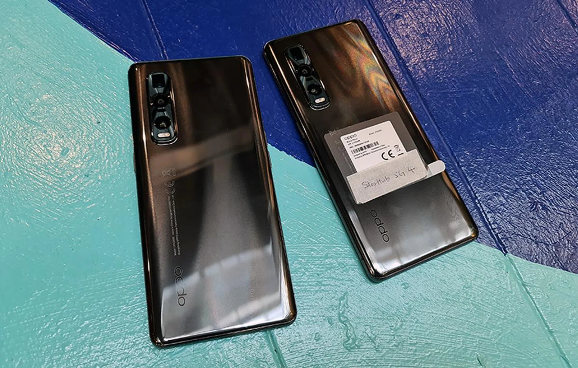 Our pair of Oppo Find X2 flagship phones - one with 5G firmware enabled, and the other still using current commercial firmware.