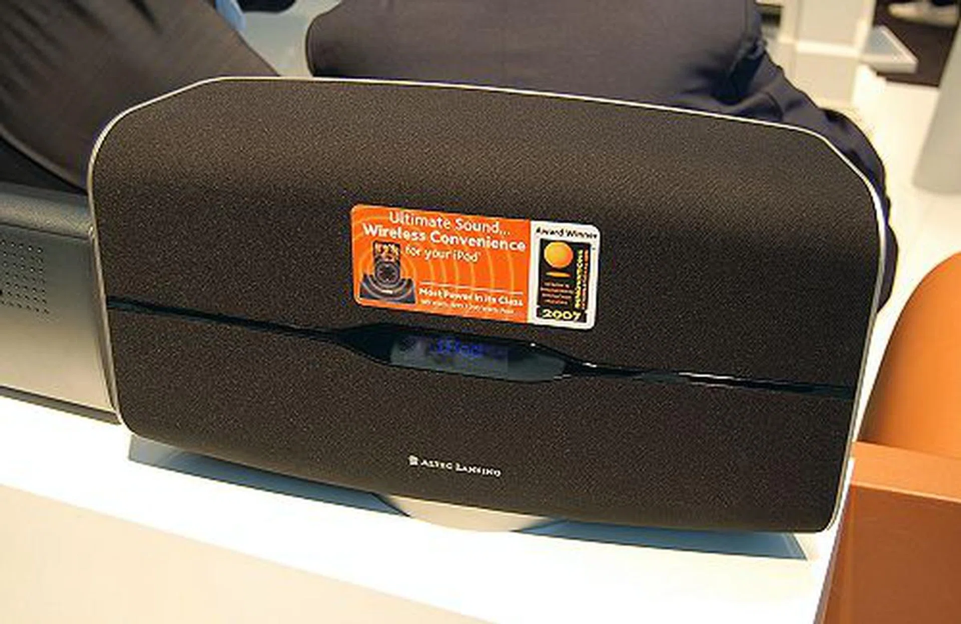  The Altec Lansing M812 is wireless home music system. Using a dock that can be place anywhere else in your home, for example your room, but you can mount the main speaker unit up to 30 meters away anywhere else in your home and either on the desk or on the wall. It claims to deliver a room-filling 100 watts of digital power with two 4-inch woofers and a 1-inch neodymium silk dome tweeter. Includes a built-in FM tuner. You can operate the M812 system via the control buttons on the unit or via the included remote. "Unwire your Music" is the theme for this fella.  