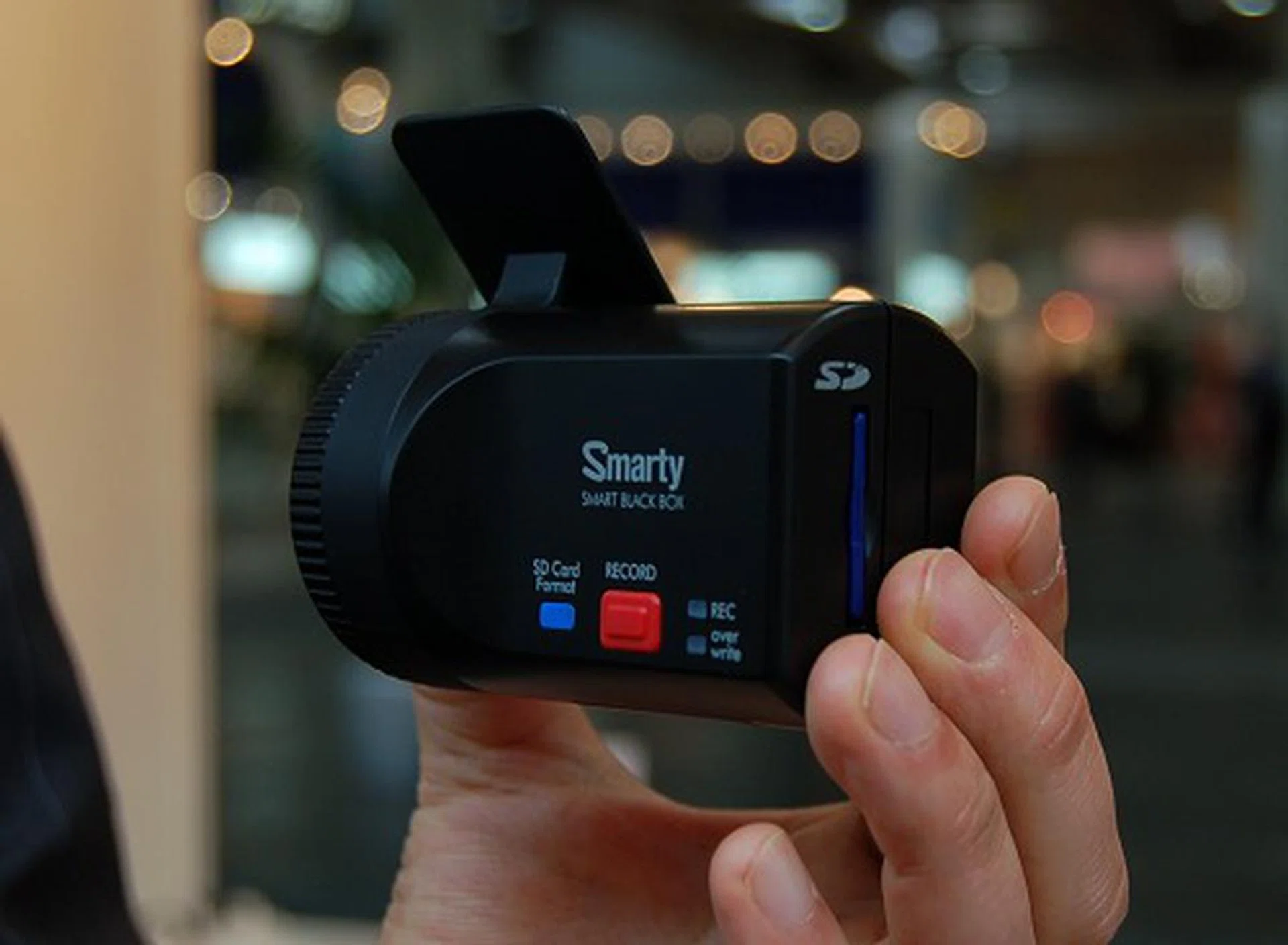  (smarty-2) Mounts on your windscreen via a double-sided tape or its equivalent, it uses an SD card to hold all recordings. The device itself has a 0.25-inch CMOS digital imaging sensor (640x480 resolution at 30fps) and activates recording on impact (has an accelerometer built-in) or via the record button as and when you require. Another variant of this unit comes with GPS functionality built-in to log location details.  