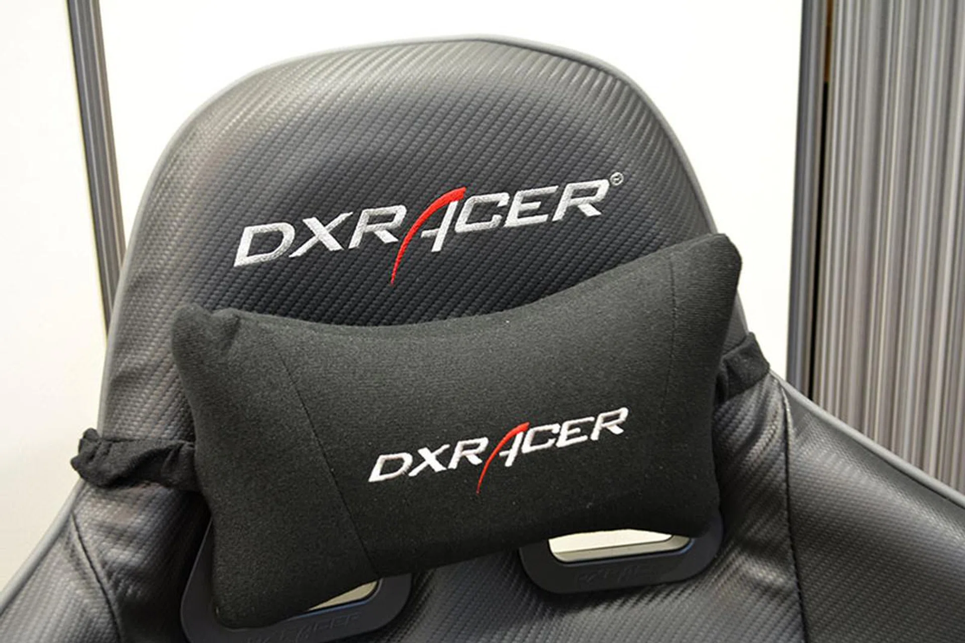 The DXRacer's head cushion is smaller and firmer.