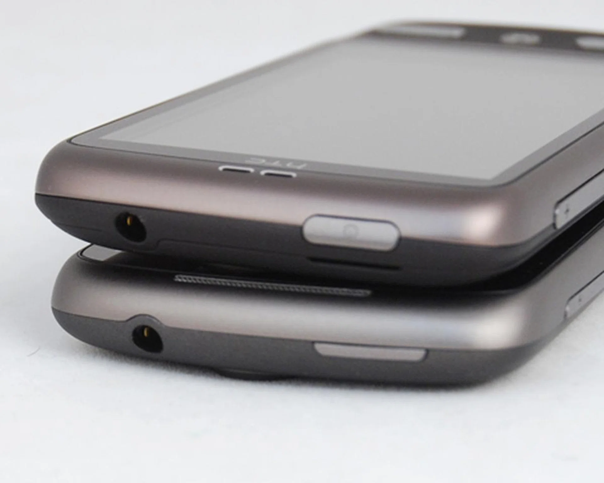 While the Nexus One's Power button is built as a thin strip, the Desire chose to compress it into a thicker and shorter strip for easier access.