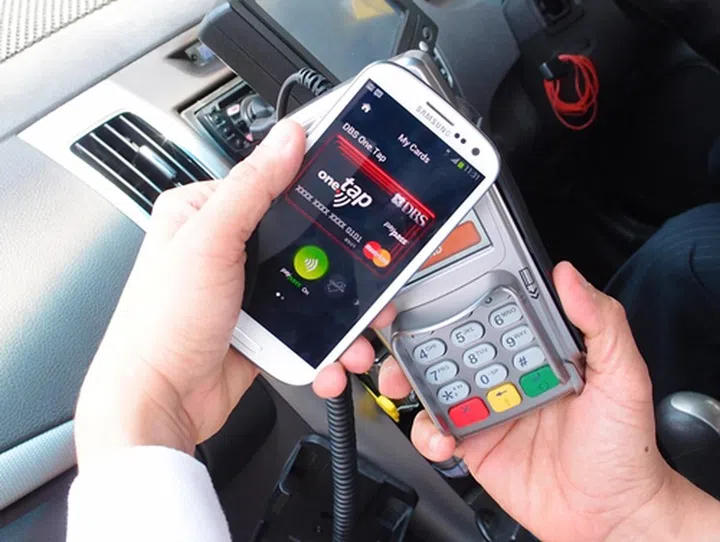 Soon, smartphone users will be able to use their devices to pay for services like taxi transport via NFC.