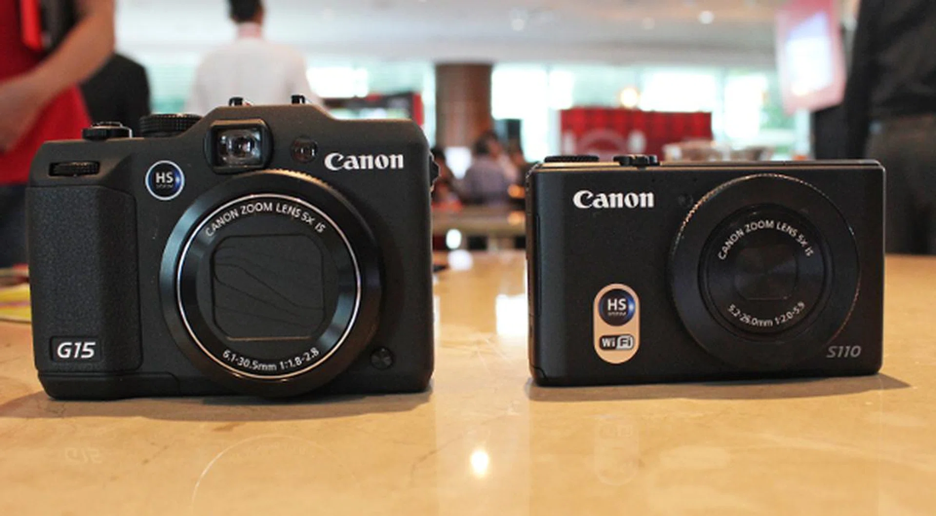 The difference in size between the G15 and the S110. 