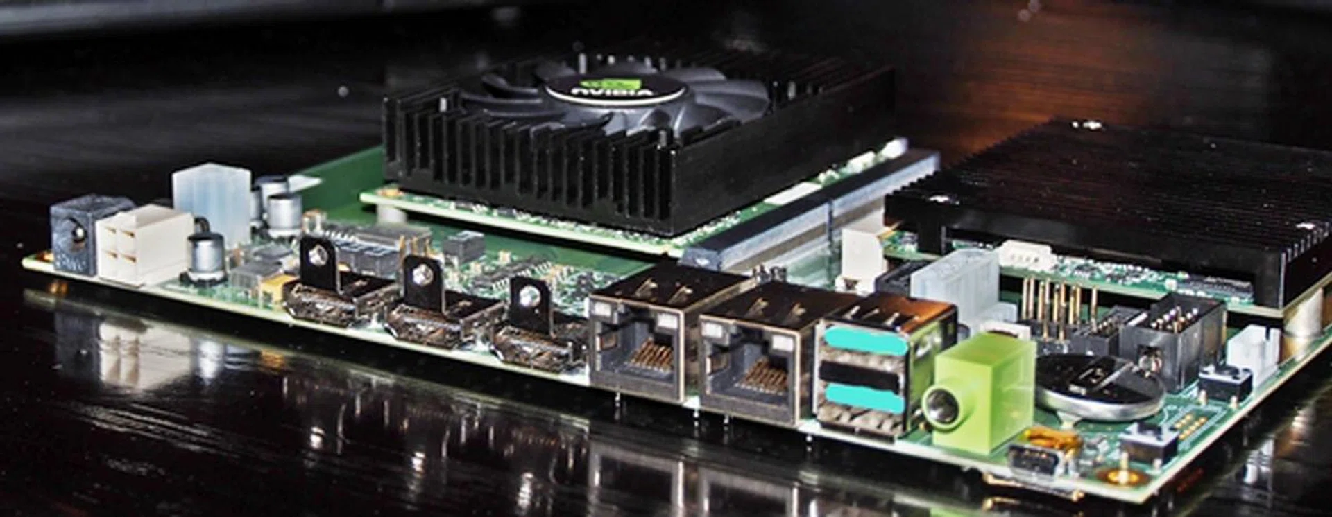 The board has 3 HDMI ports, dual Gigabit LAN ports as well as a pair of USB 3.0 ports.