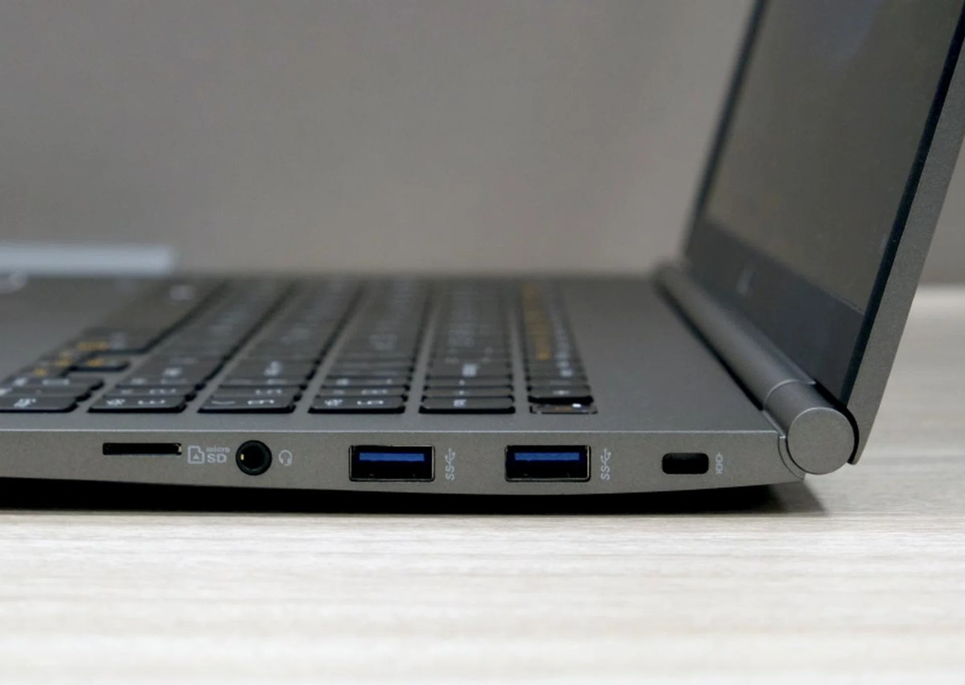 On the right, you have a microSD card reader, headphone jack, and two USB-A USB 3.0 ports.