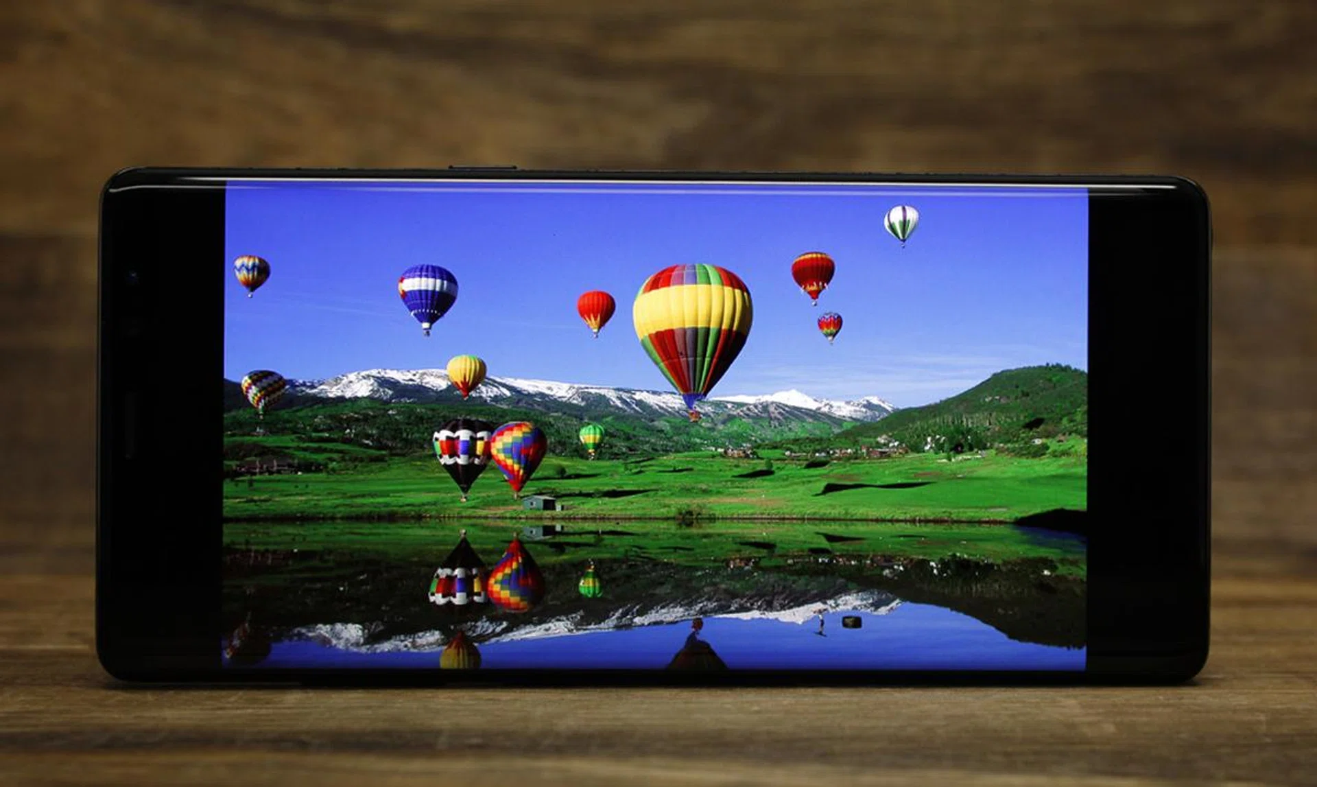 16:9 content will display with black borders on the sides.